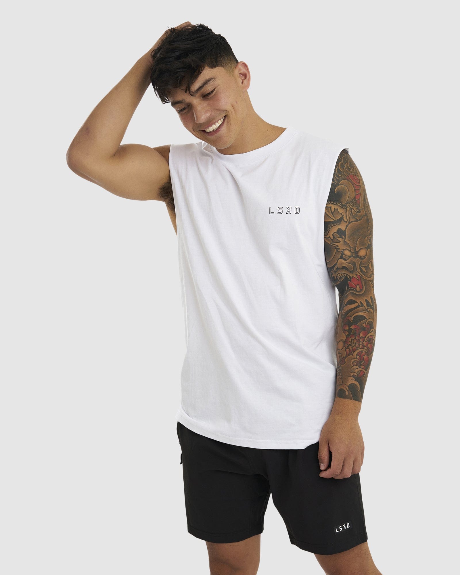 Model wearing LTD Tank Vintage Fit - White