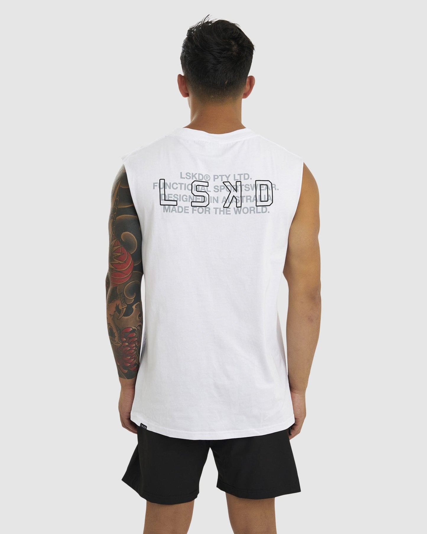 Model wearing LTD Tank Vintage Fit - White