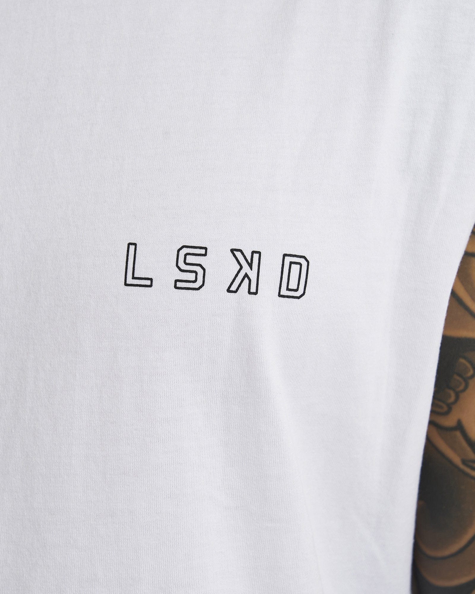 Model wearing LTD Tank Vintage Fit - White