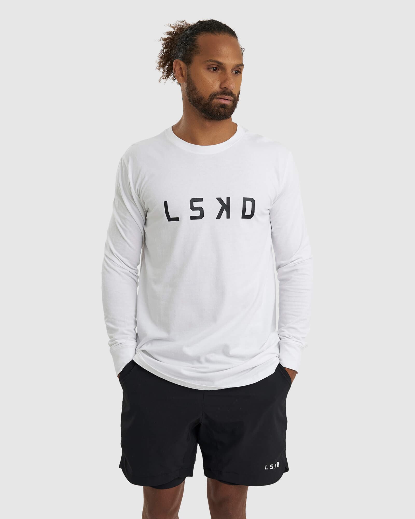 Model wearing Power FLXDRY Performance LS Tee - White