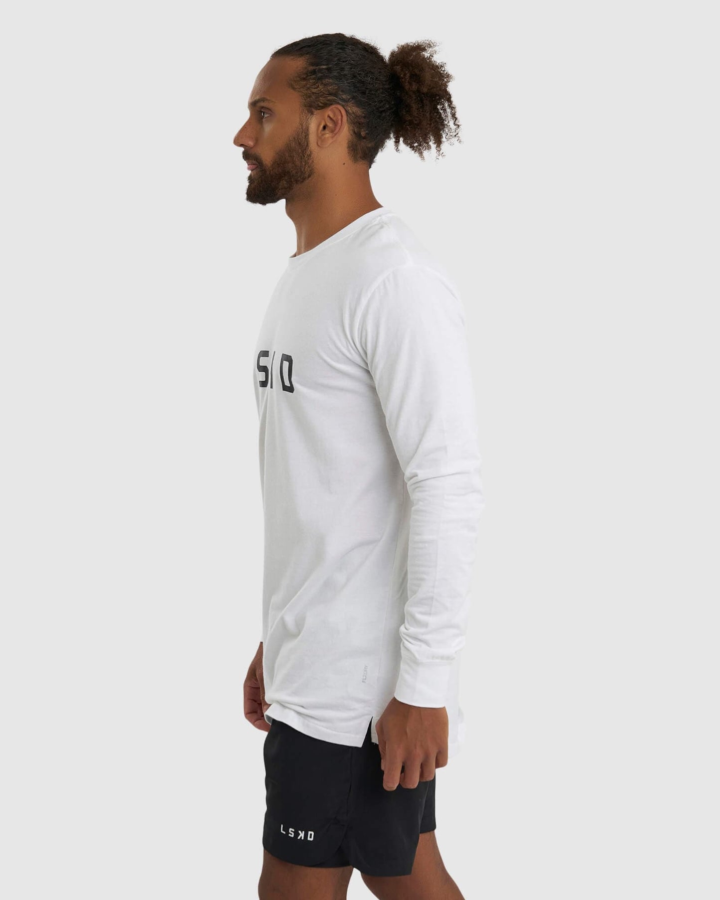 Model wearing Power FLXDRY Performance LS Tee - White