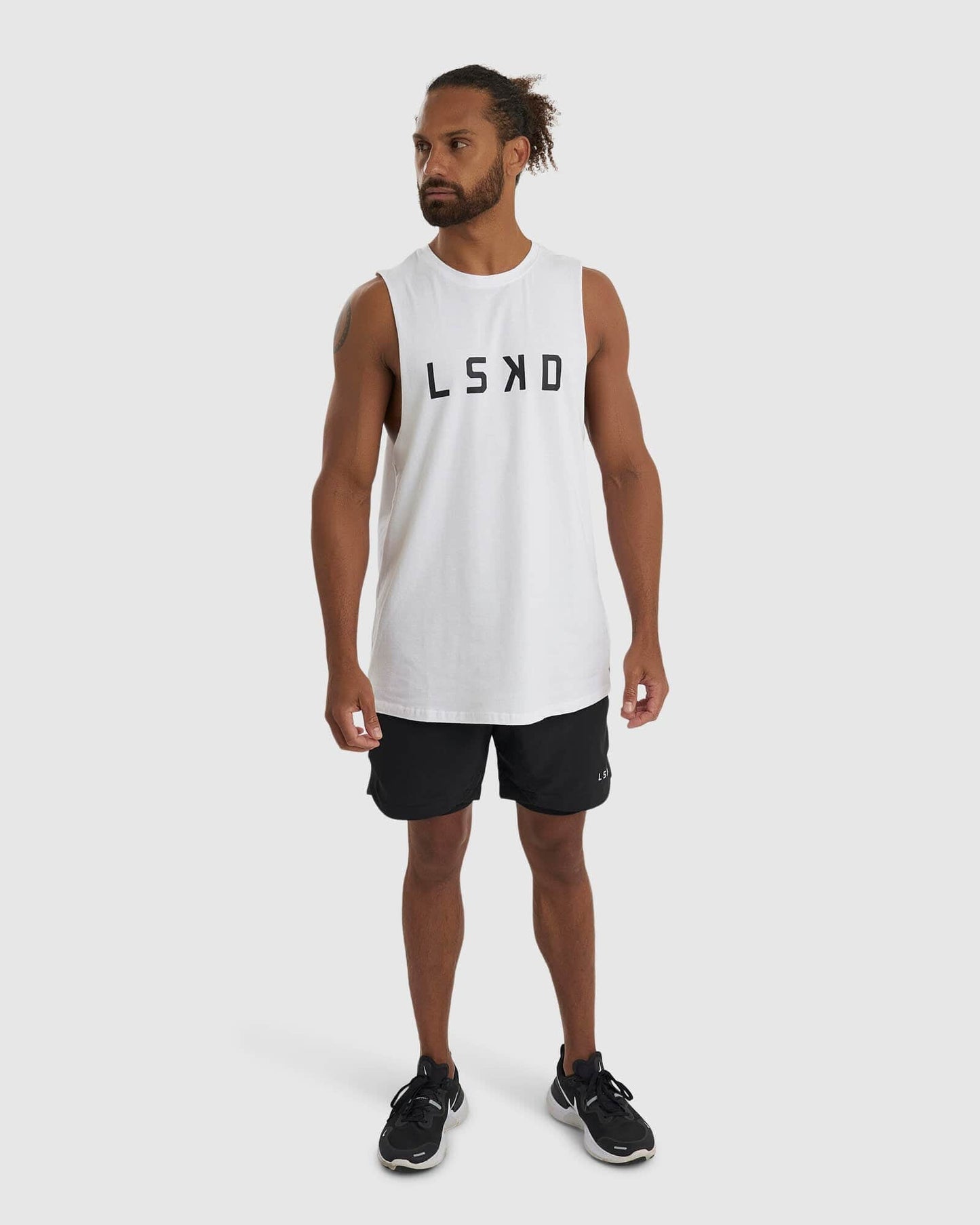 Model wearing Power FLXDRY Performance Tank - White
