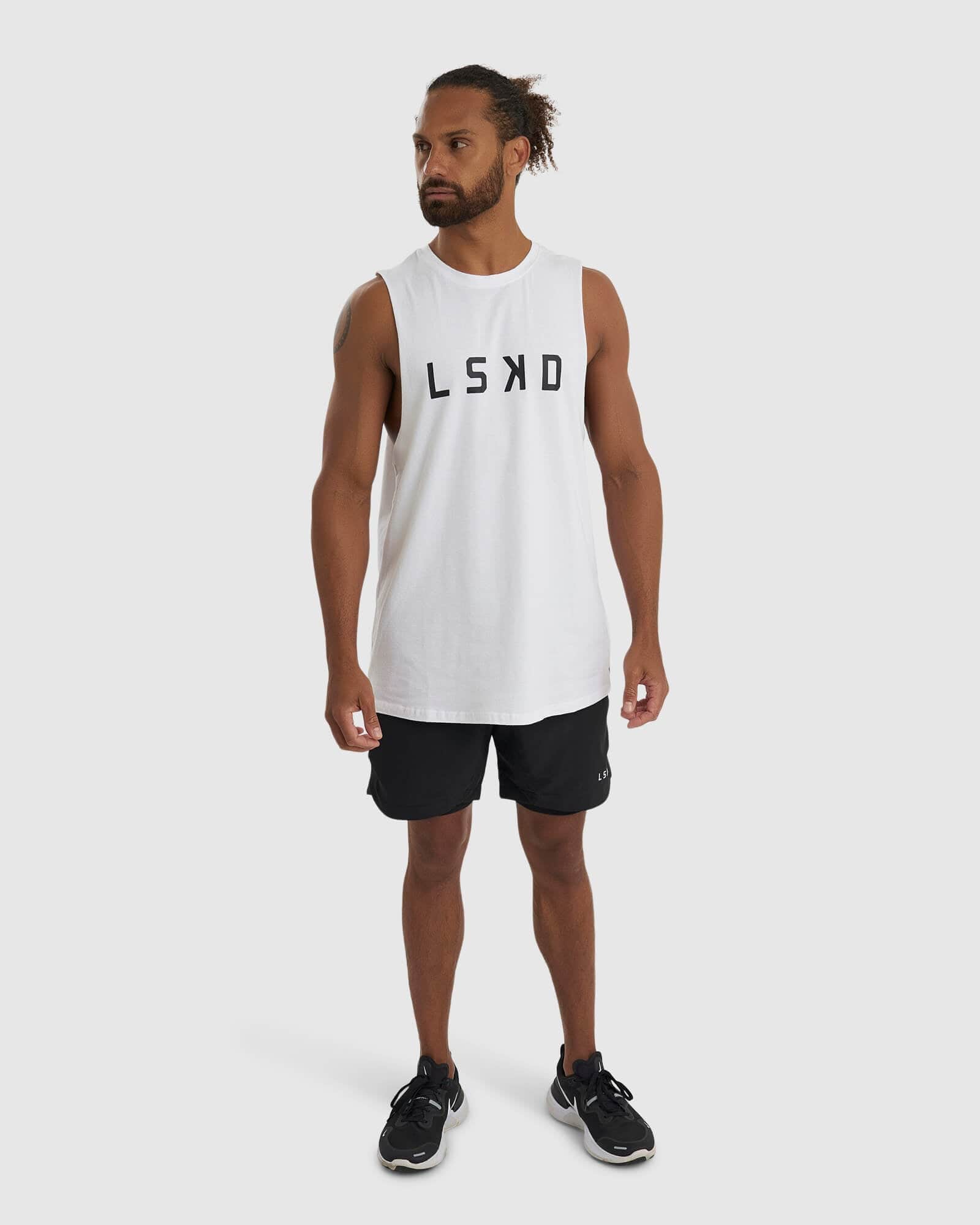 Model wearing Power FLXDRY Performance Tank - White