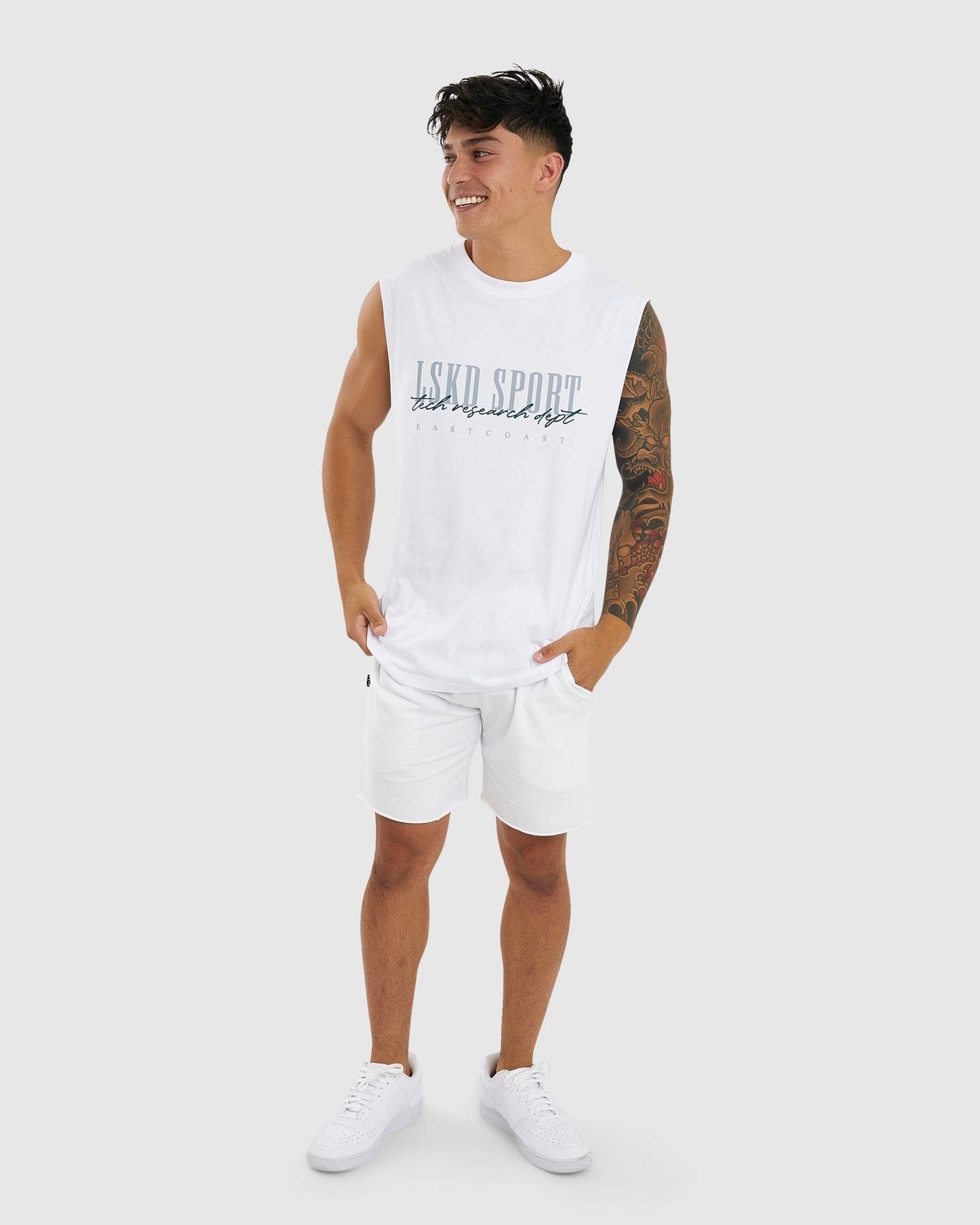 Model wearing Faculty Tank Vintage Fit - White