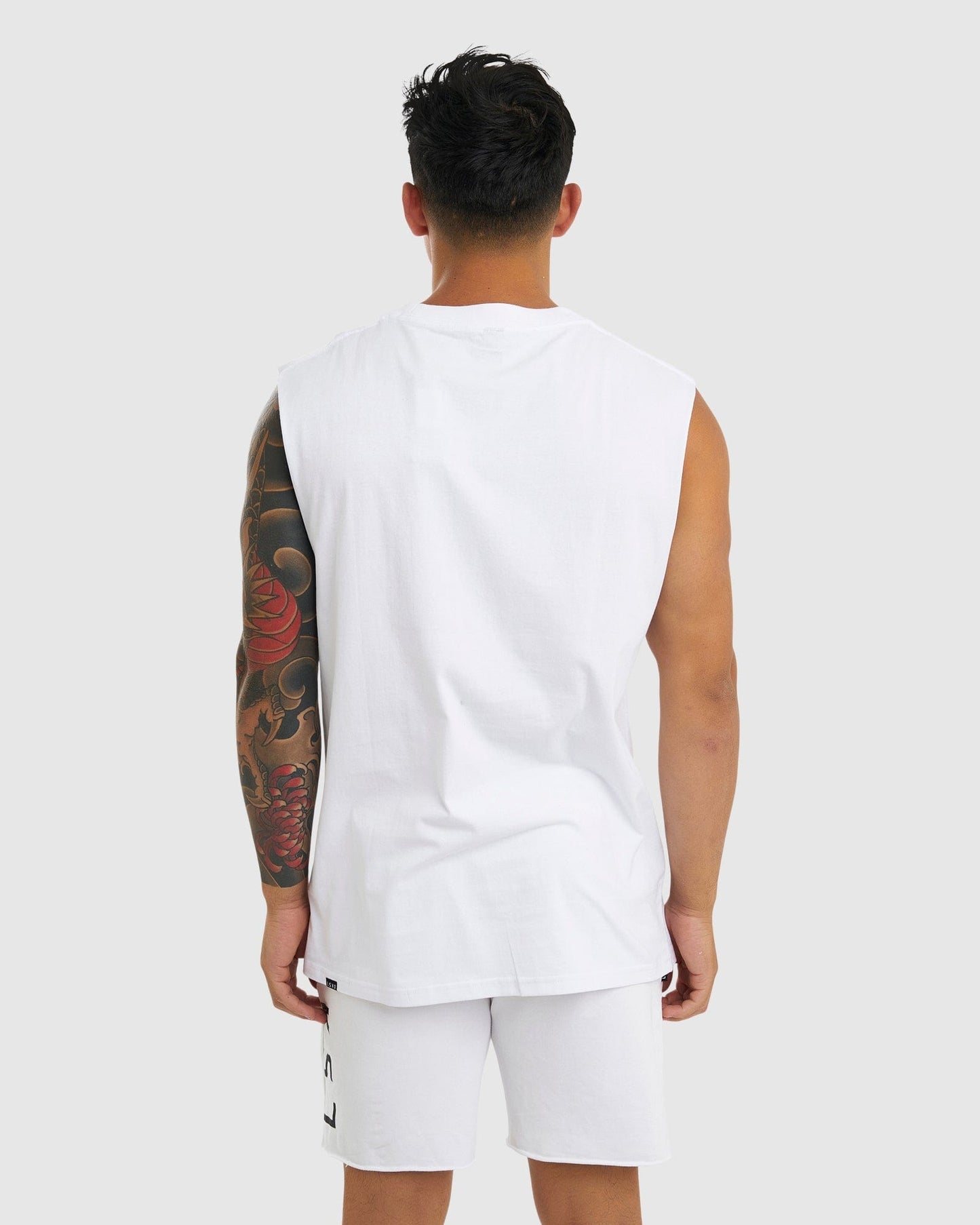 Model wearing Faculty Tank Vintage Fit - White
