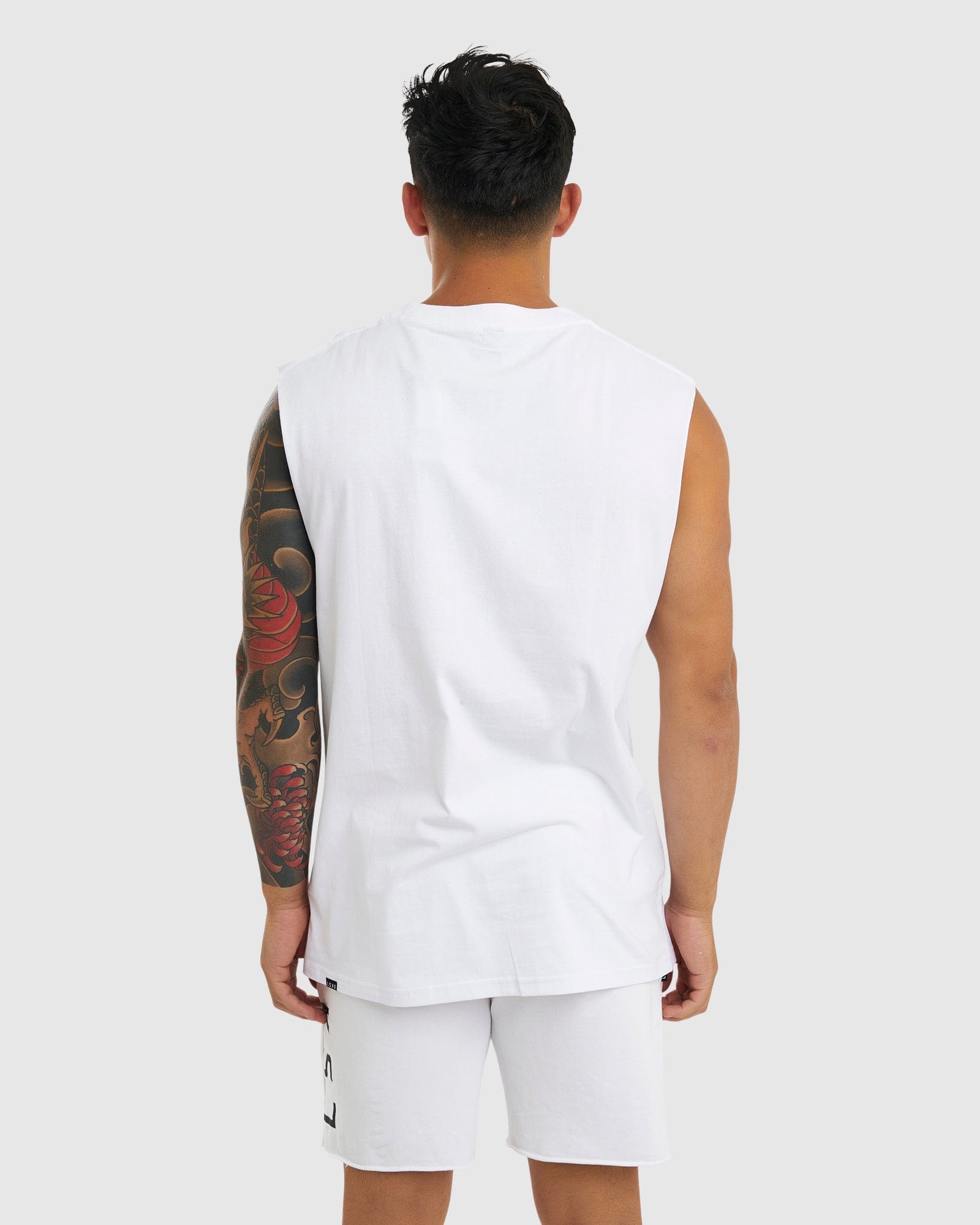 Model wearing Faculty Tank Vintage Fit - White
