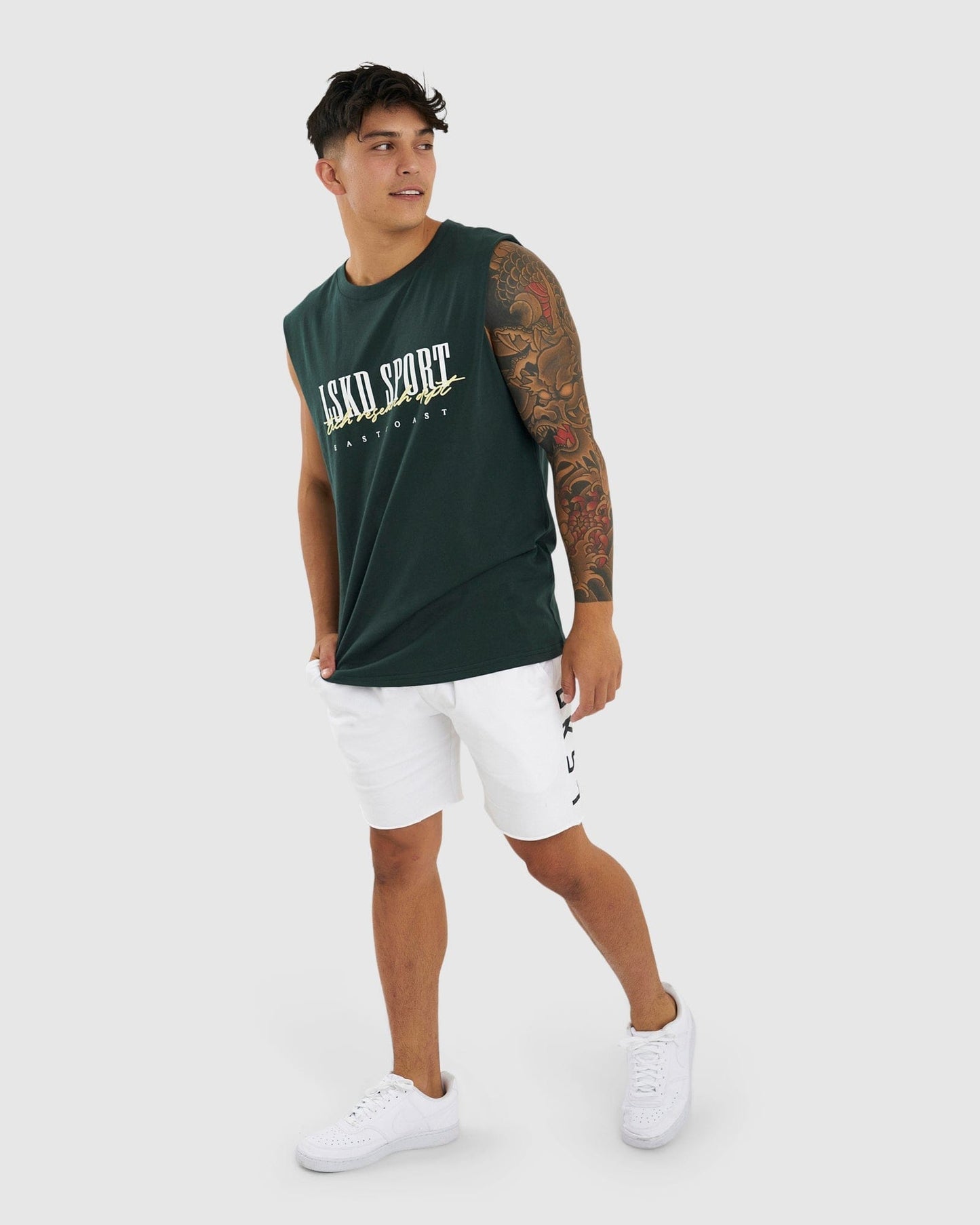 Model wearing Faculty Tank Vintage Fit - Vital Green