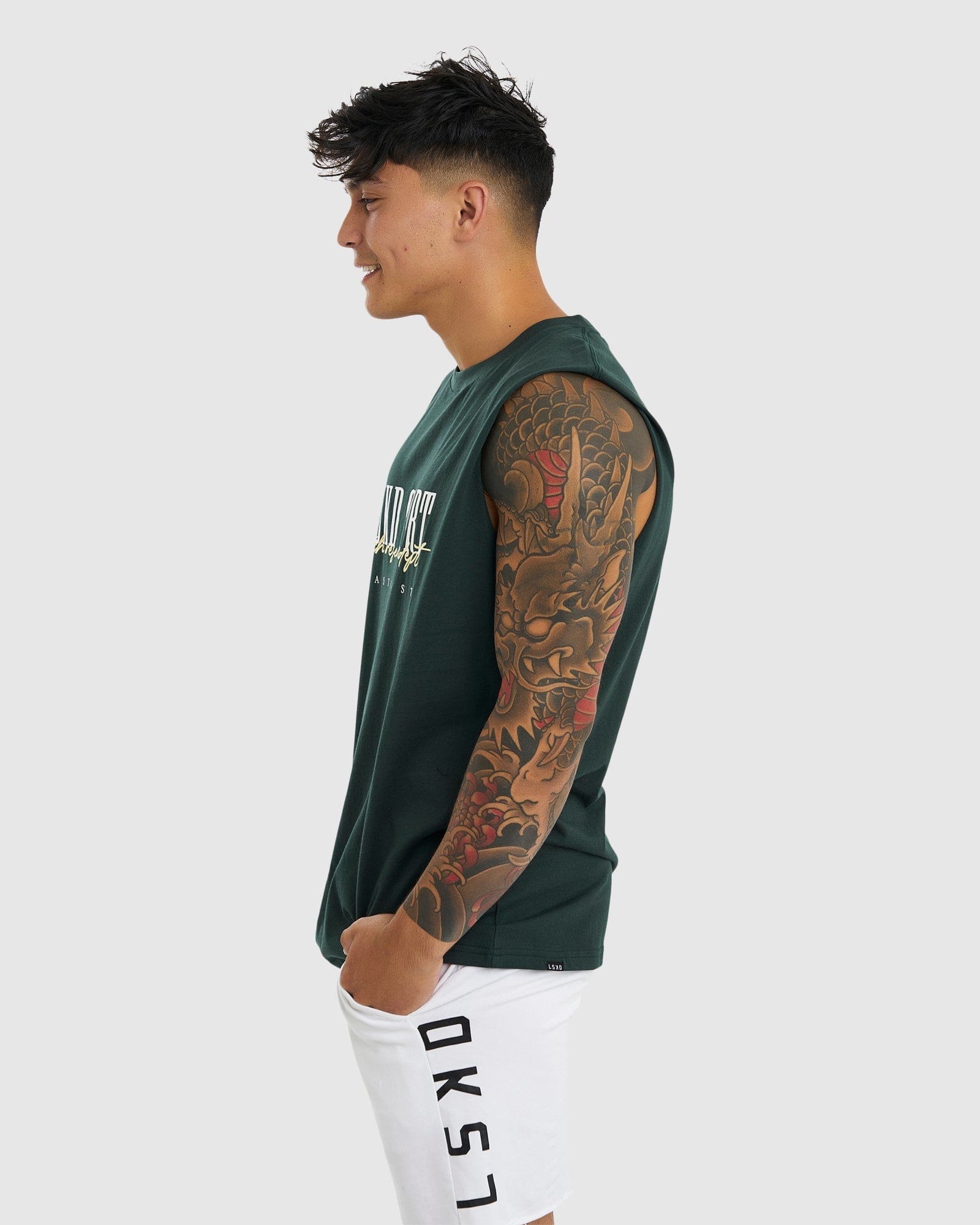 Model wearing Faculty Tank Vintage Fit - Vital Green