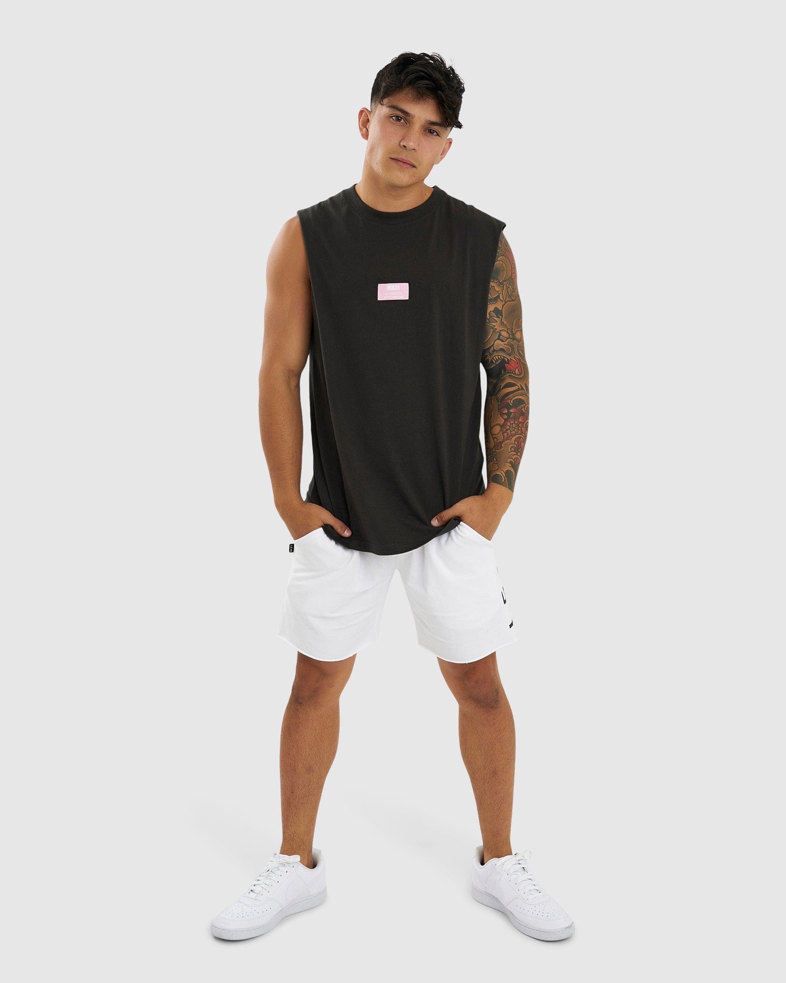 Model wearing Merch Tank Vintage Fit - Pirate Black