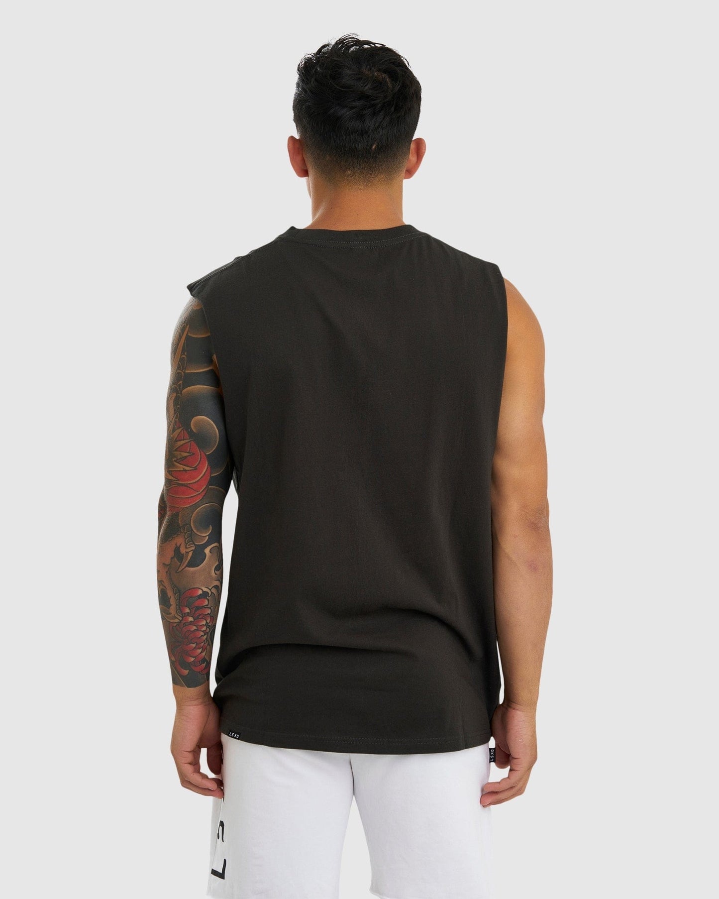 Model wearing Merch Tank Vintage Fit - Pirate Black
