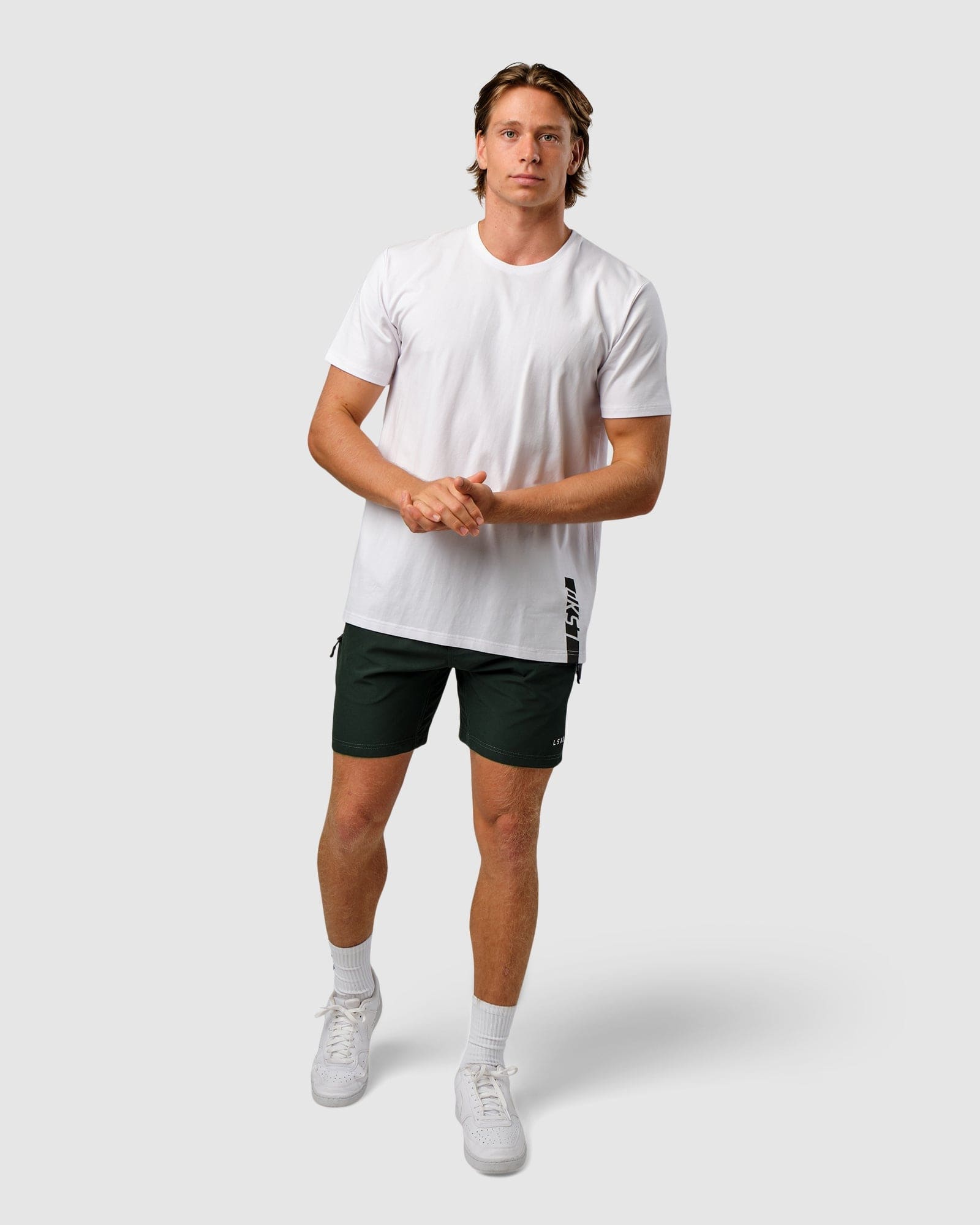 Model wearing Feature Tee - White