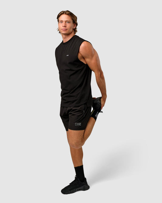 Model wearing Capsule Tank Oversize - Black