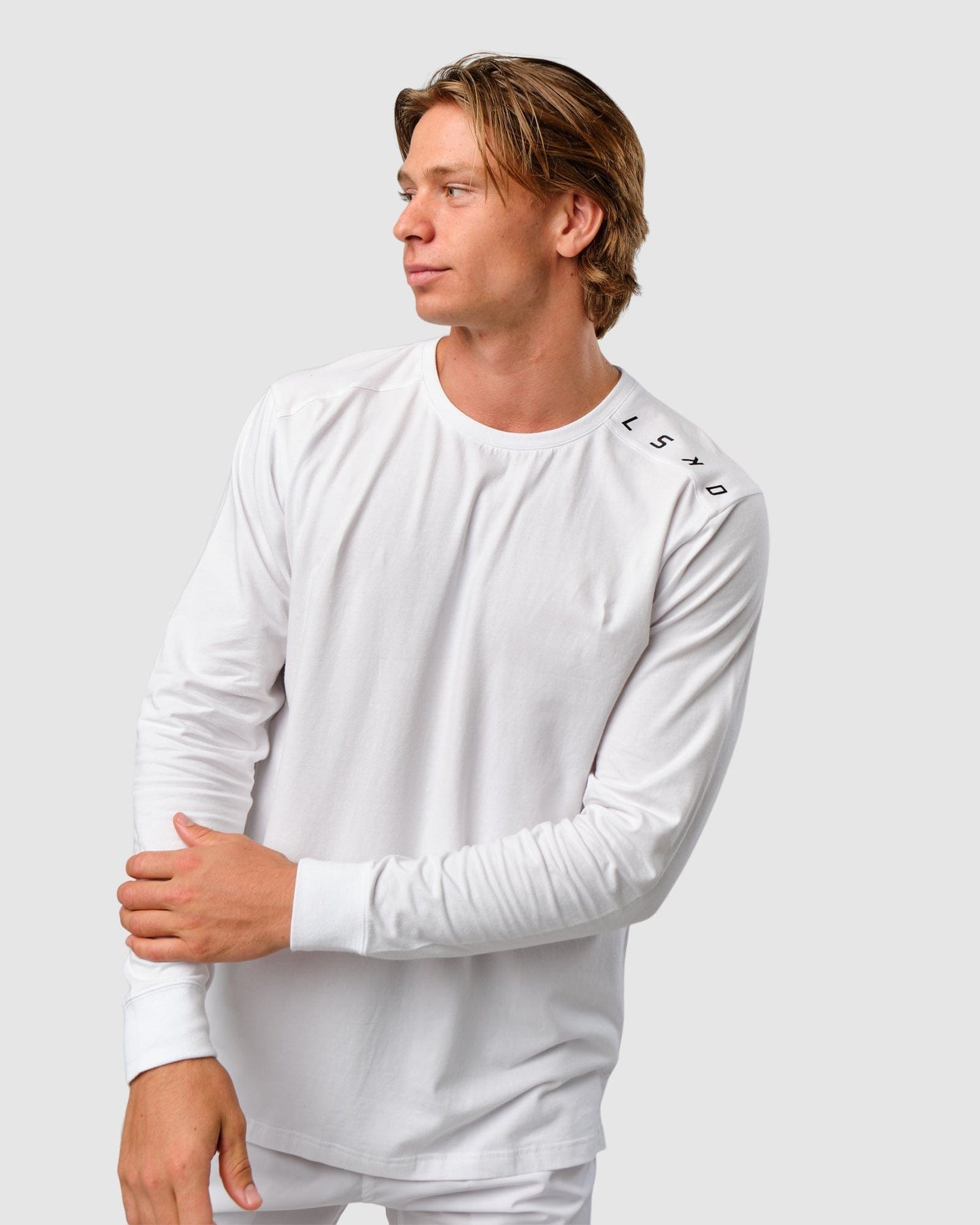 Model wearing Competitor LS Tee - White