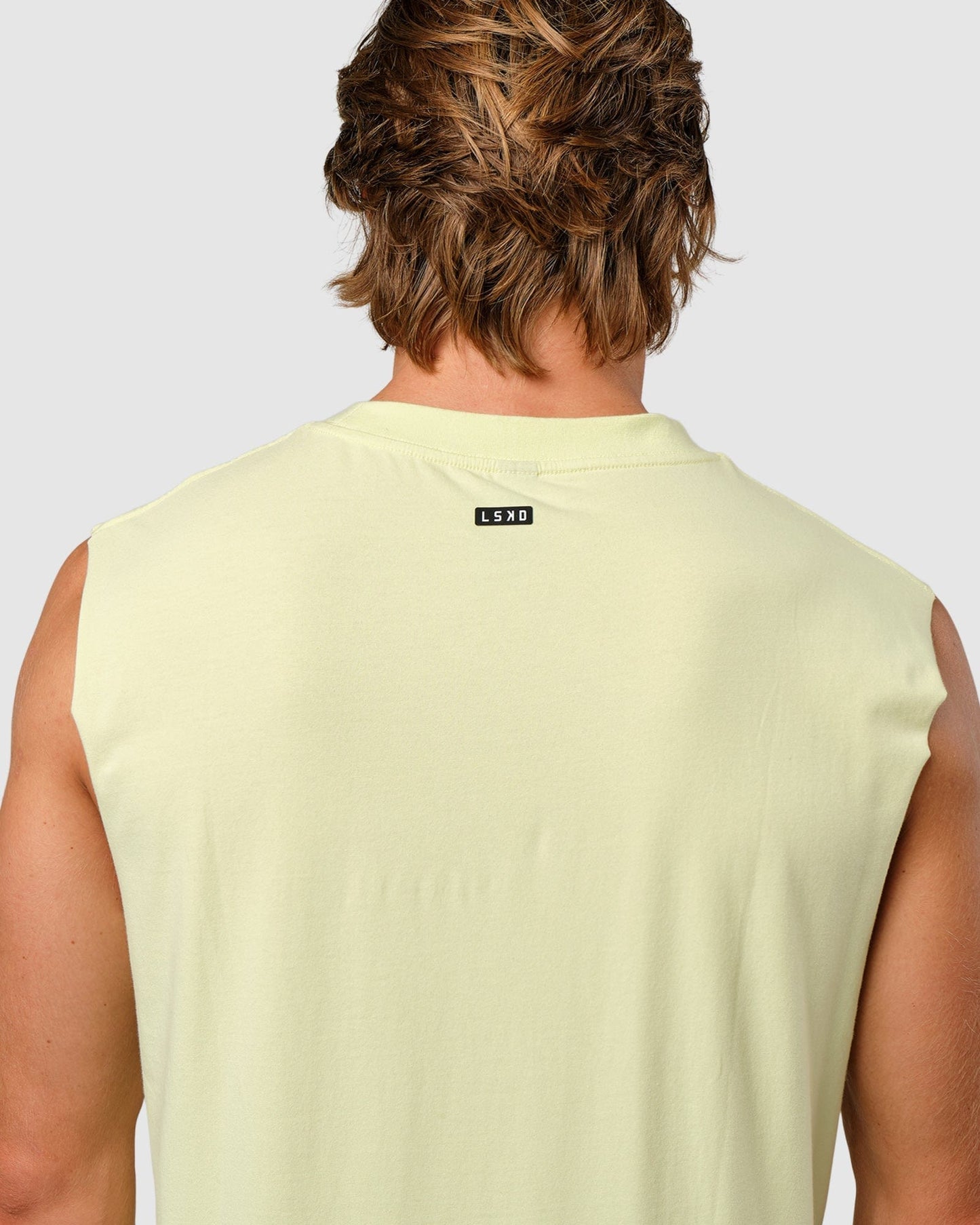 Model wearing Capsule Tank Oversize - Pastel Lime