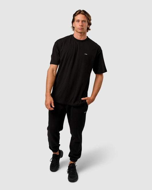 Model wearing Capsule Tee Oversize - Black