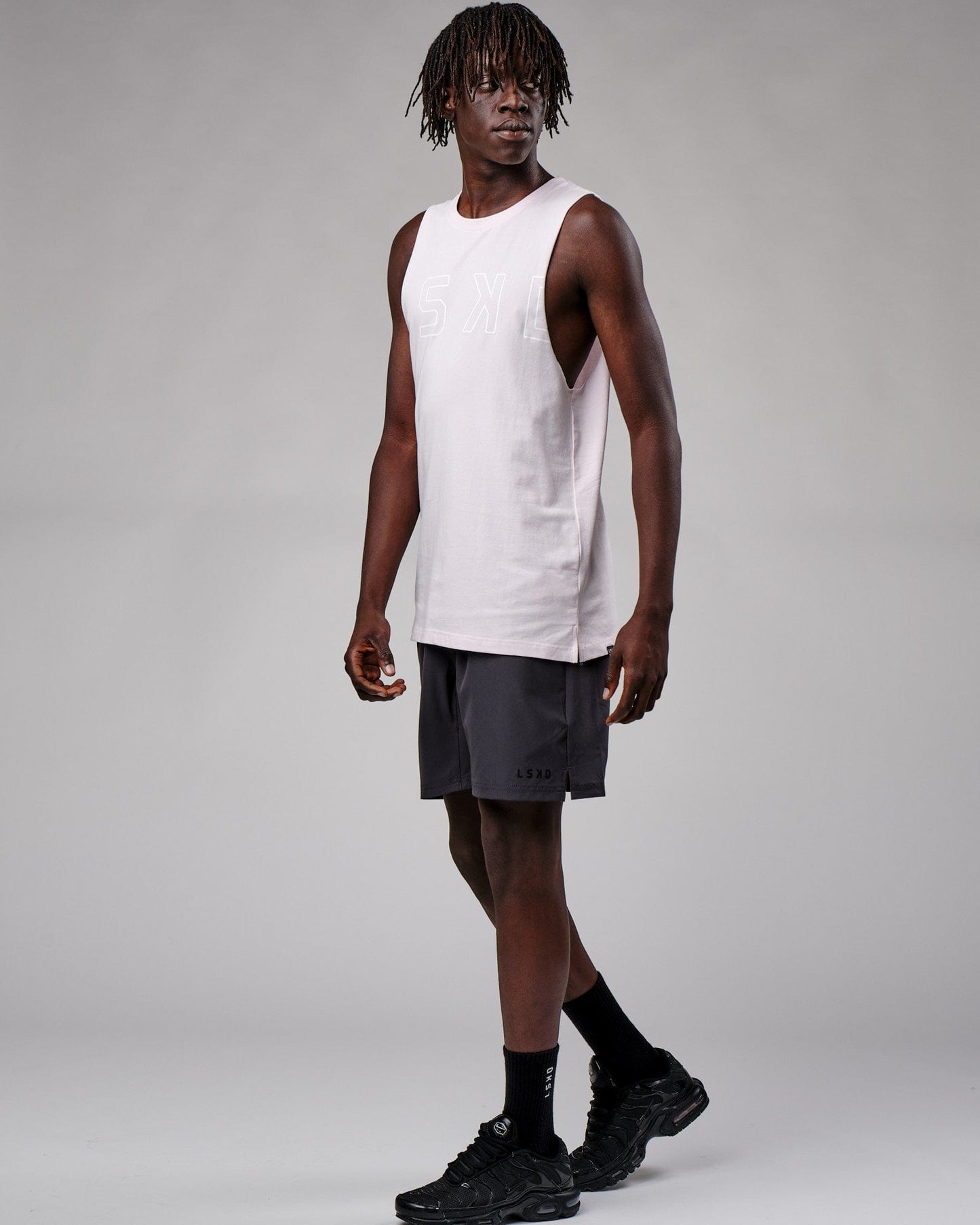 Model wearing Expand FLXCotton Training Fit Tank - Orchid Ice