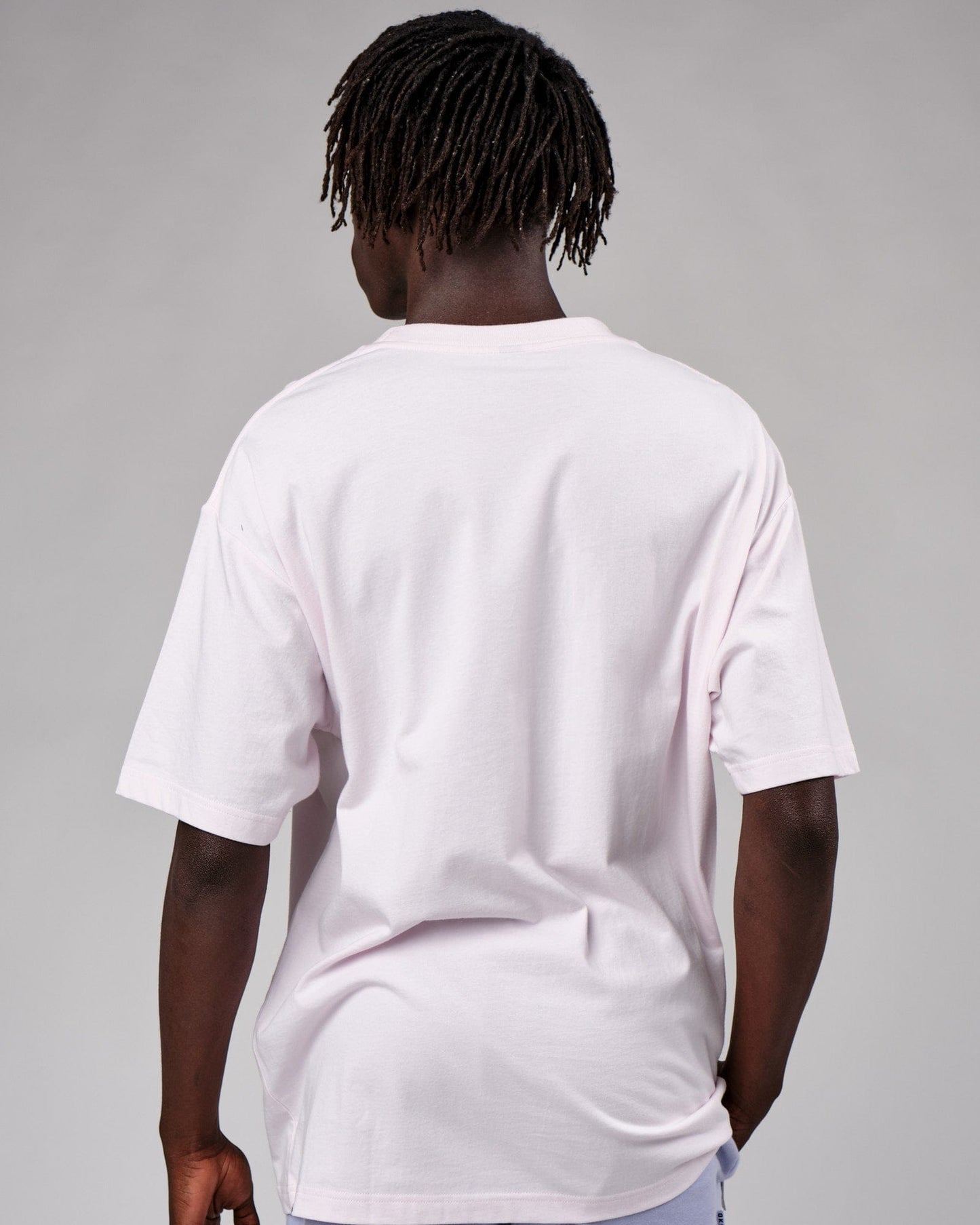 Model wearing Cornerstone Tee Oversize - Orchid Ice