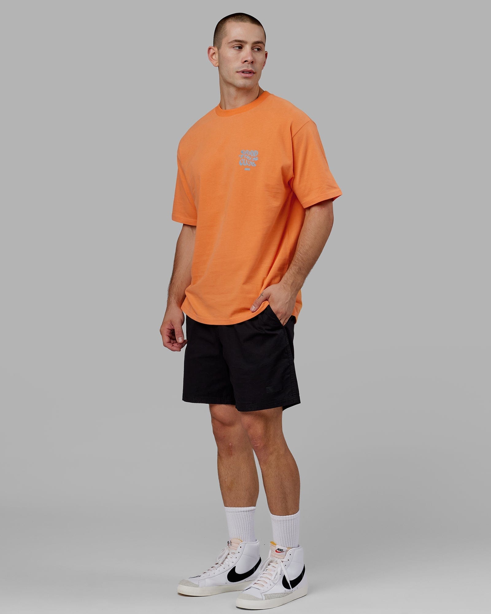 Model wearing Good Times Heavyweight Tee Oversize - Tangerine-Blue