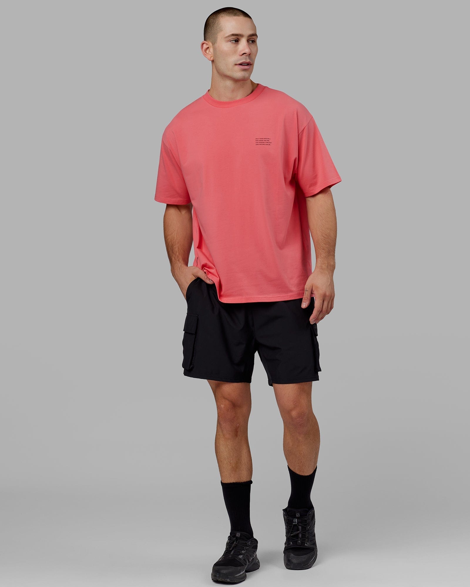 Model wearing Strive FLXCotton Tee Oversize - Sunkist Coral