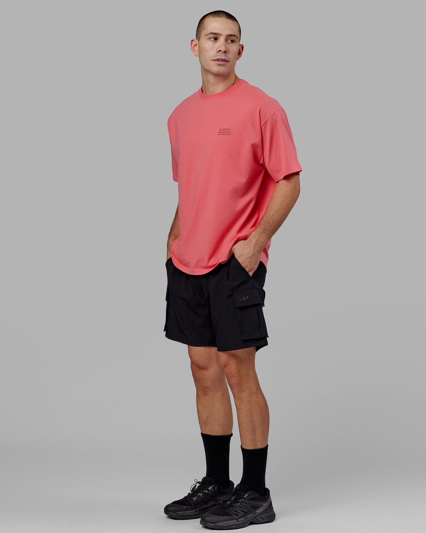 Model wearing Strive FLXCotton Tee Oversize - Sunkist Coral
