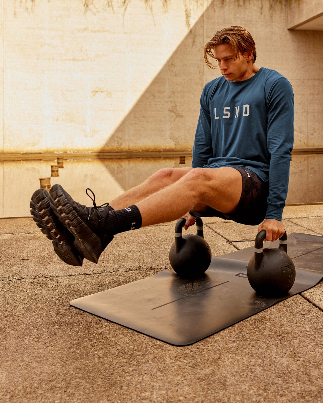 Model wearing Power FLXDRY Performance LS Tee - Light Navy