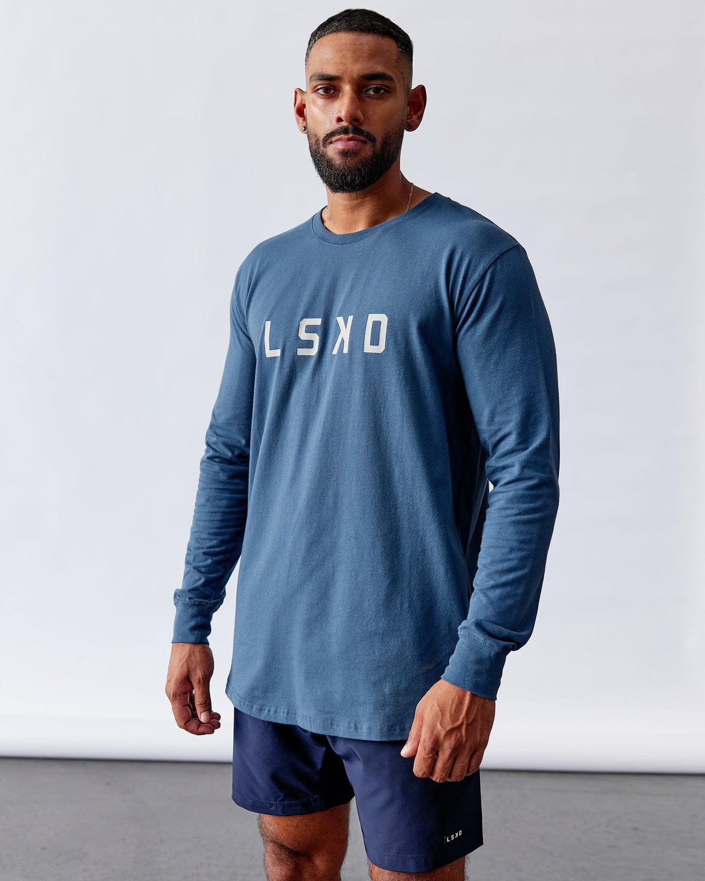 Model wearing Power FLXDRY Performance LS Tee - Light Navy