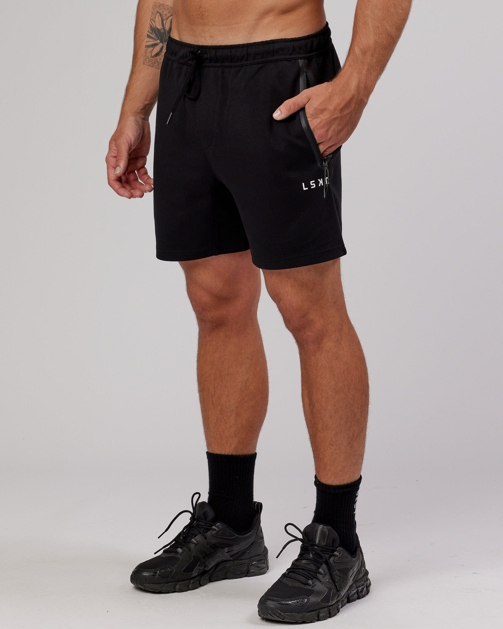 Model wearing Athlete ForgedFleece Track Short - Black