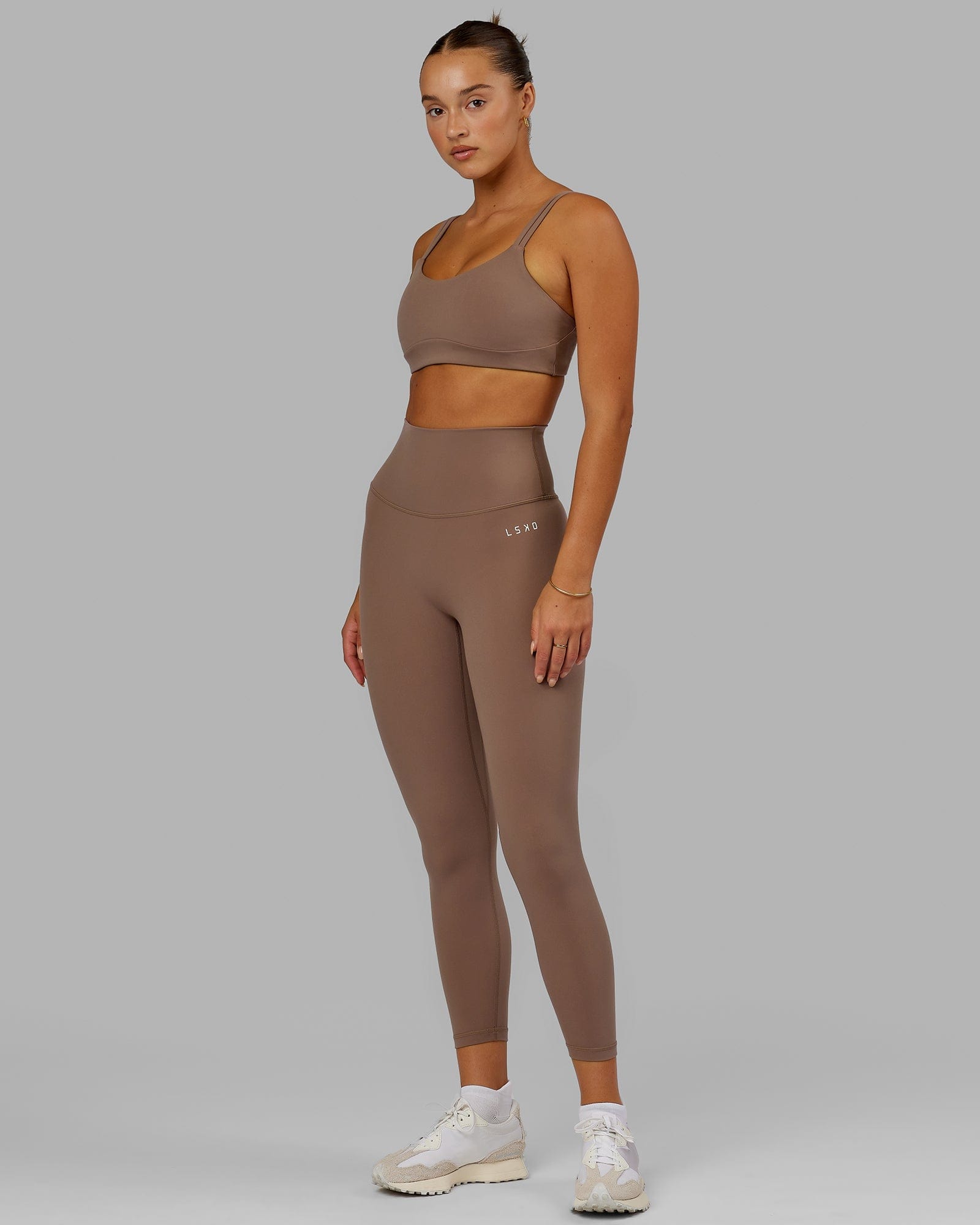 Model wearing Base 2.0 7/8 Length Tight - Deep Taupe