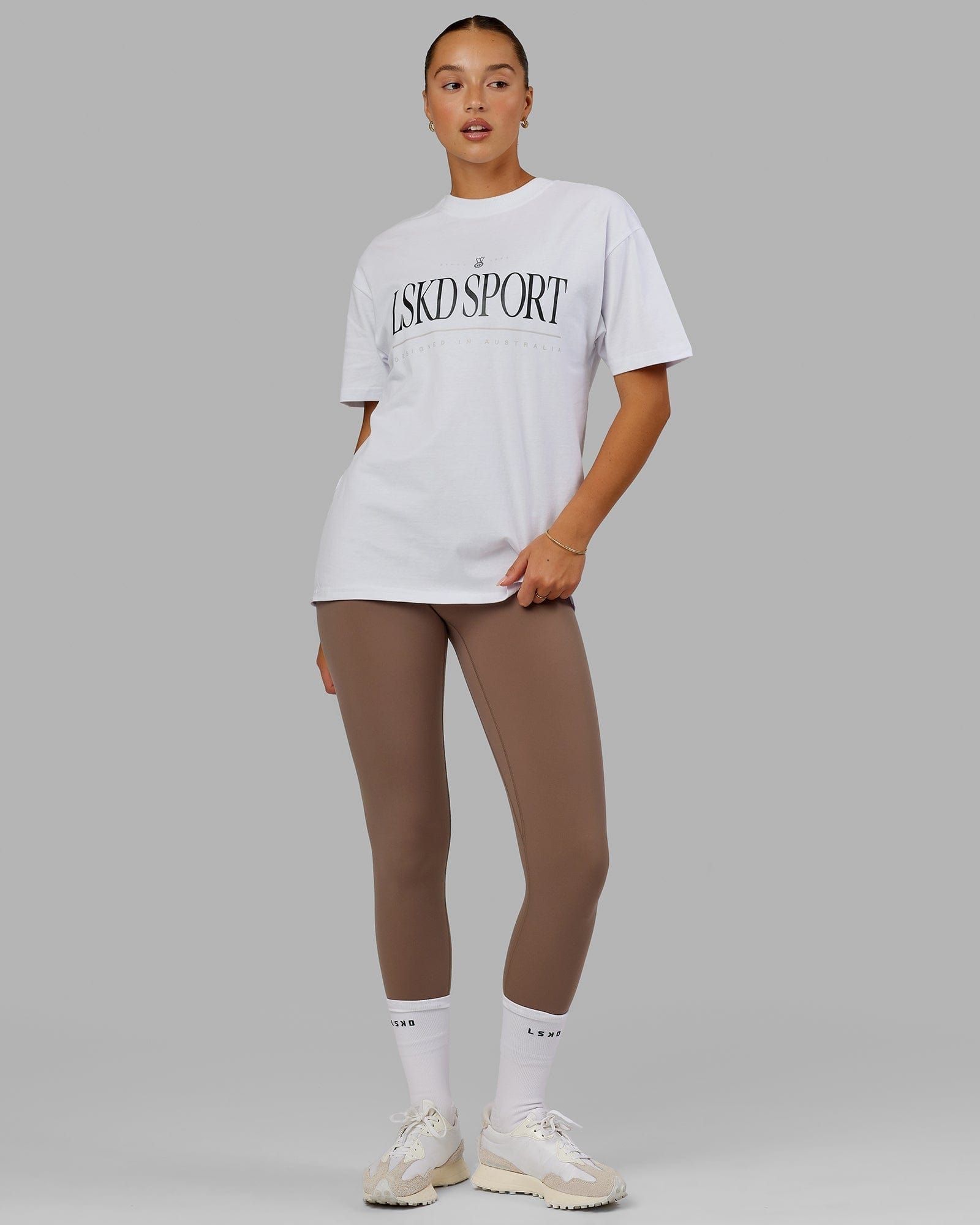 Model wearing Base 2.0 7/8 Length Tight - Deep Taupe