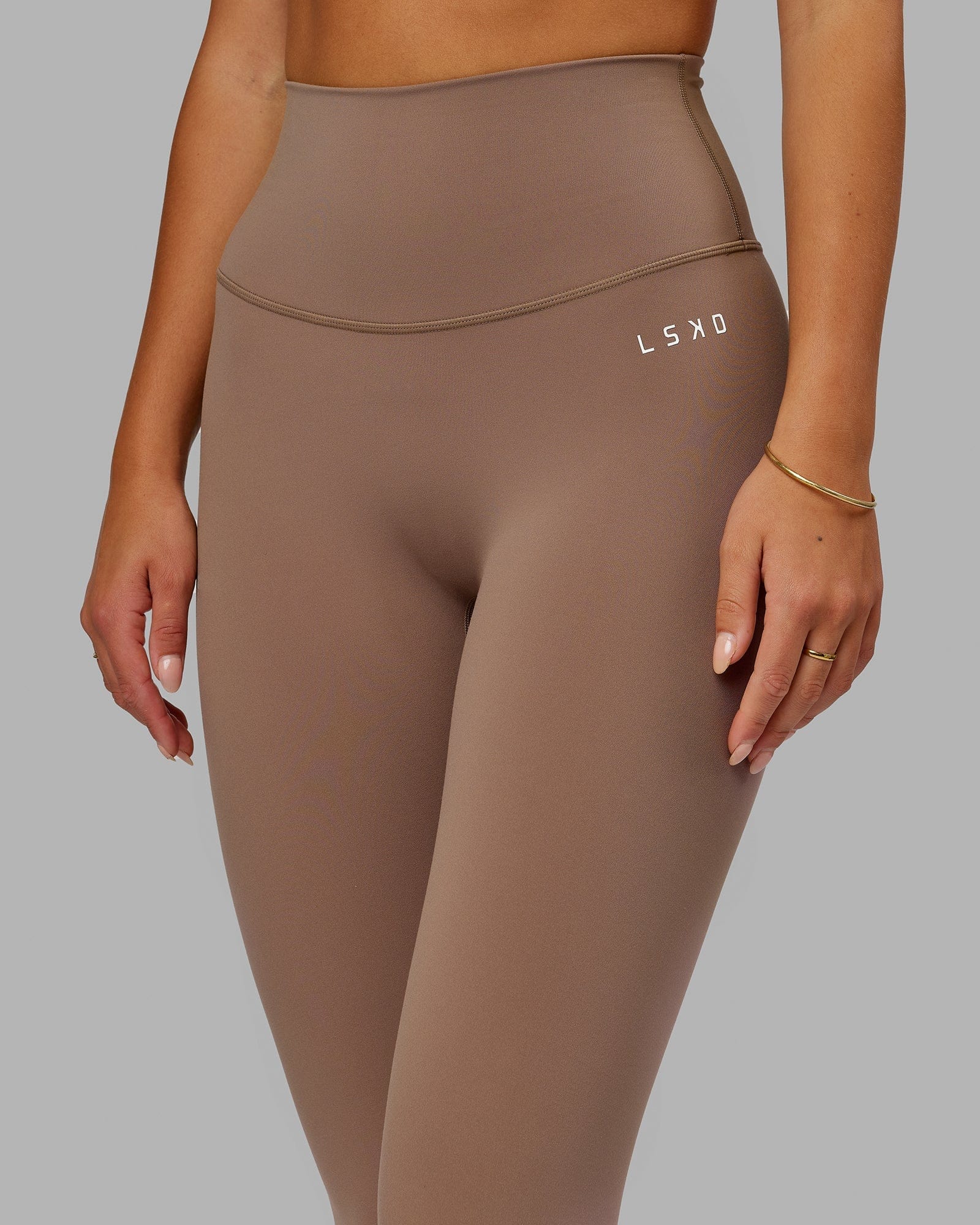 Model wearing Base 2.0 Full Length Tight - Deep Taupe