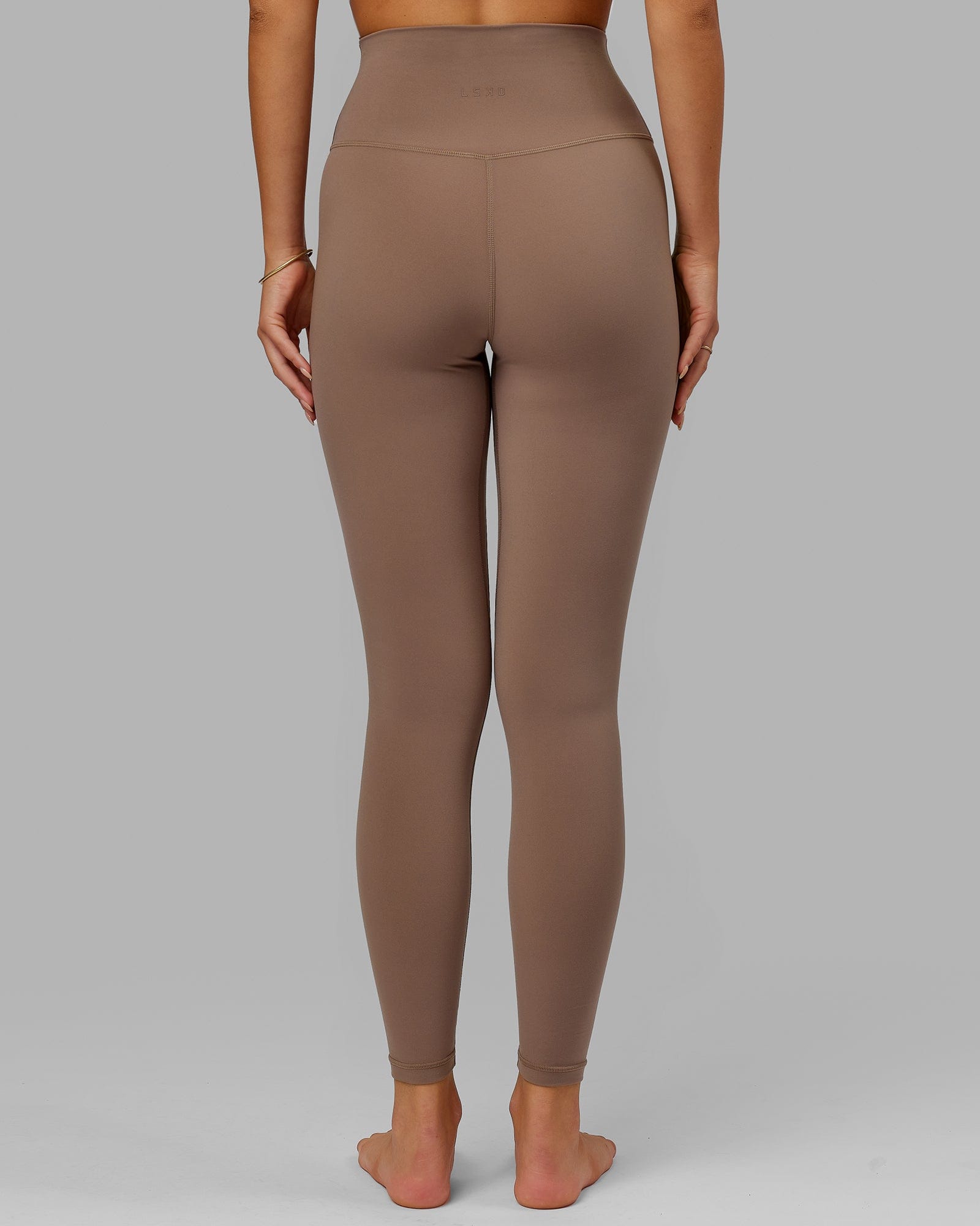 Model wearing Base 2.0 Full Length Tight - Deep Taupe