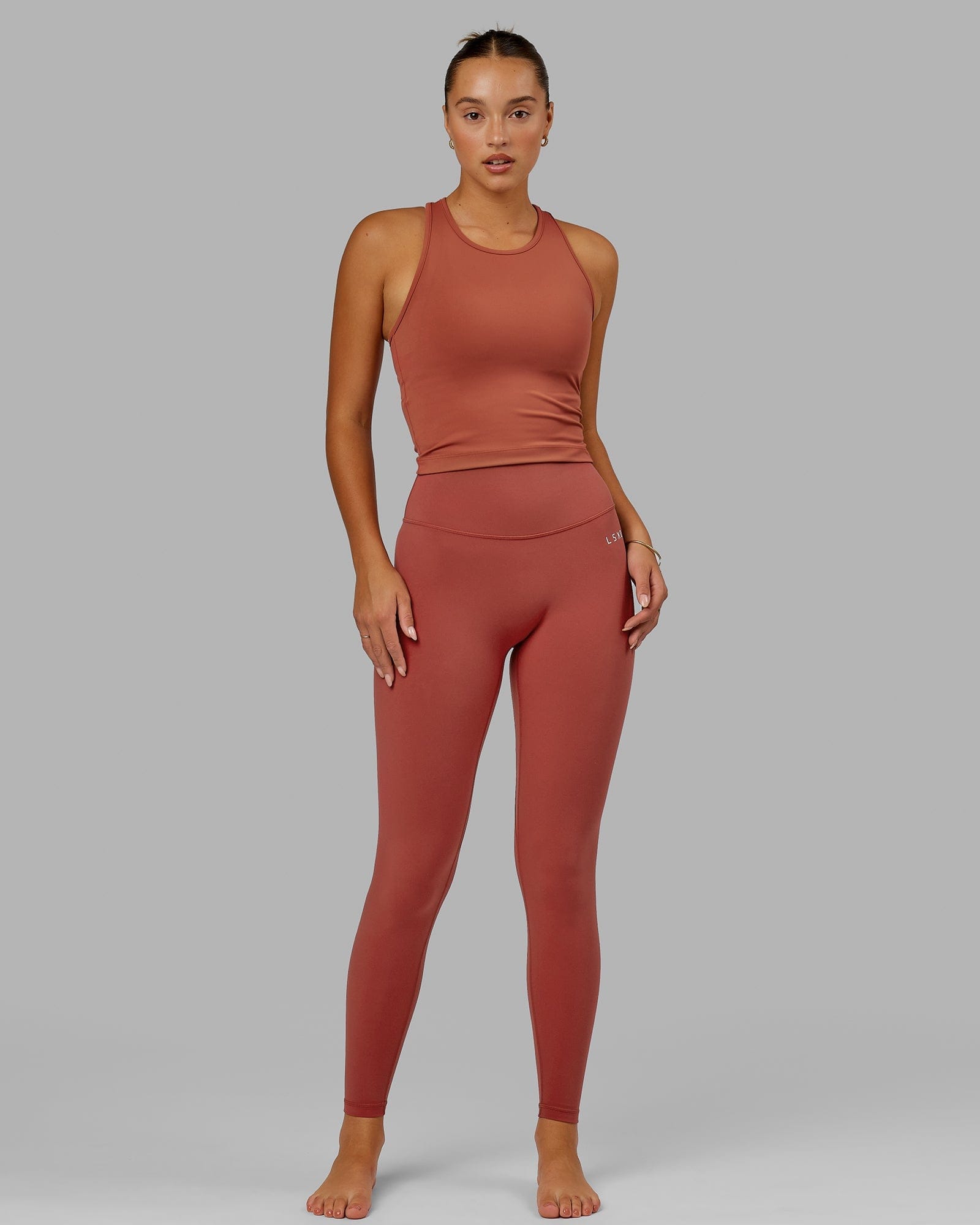 Model wearing Base 2.0 Full Length Tight - Paprika
