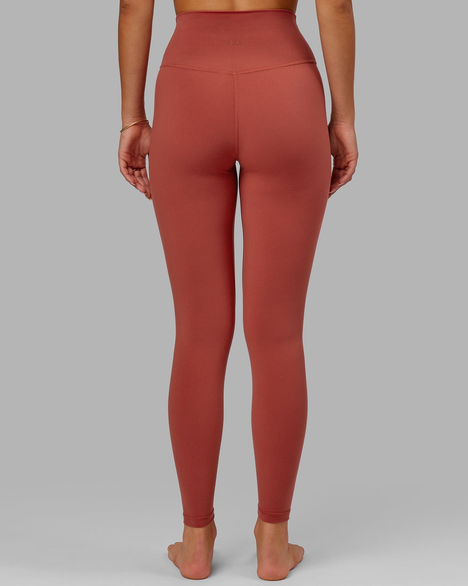 Model wearing Base 2.0 Full Length Tight - Paprika