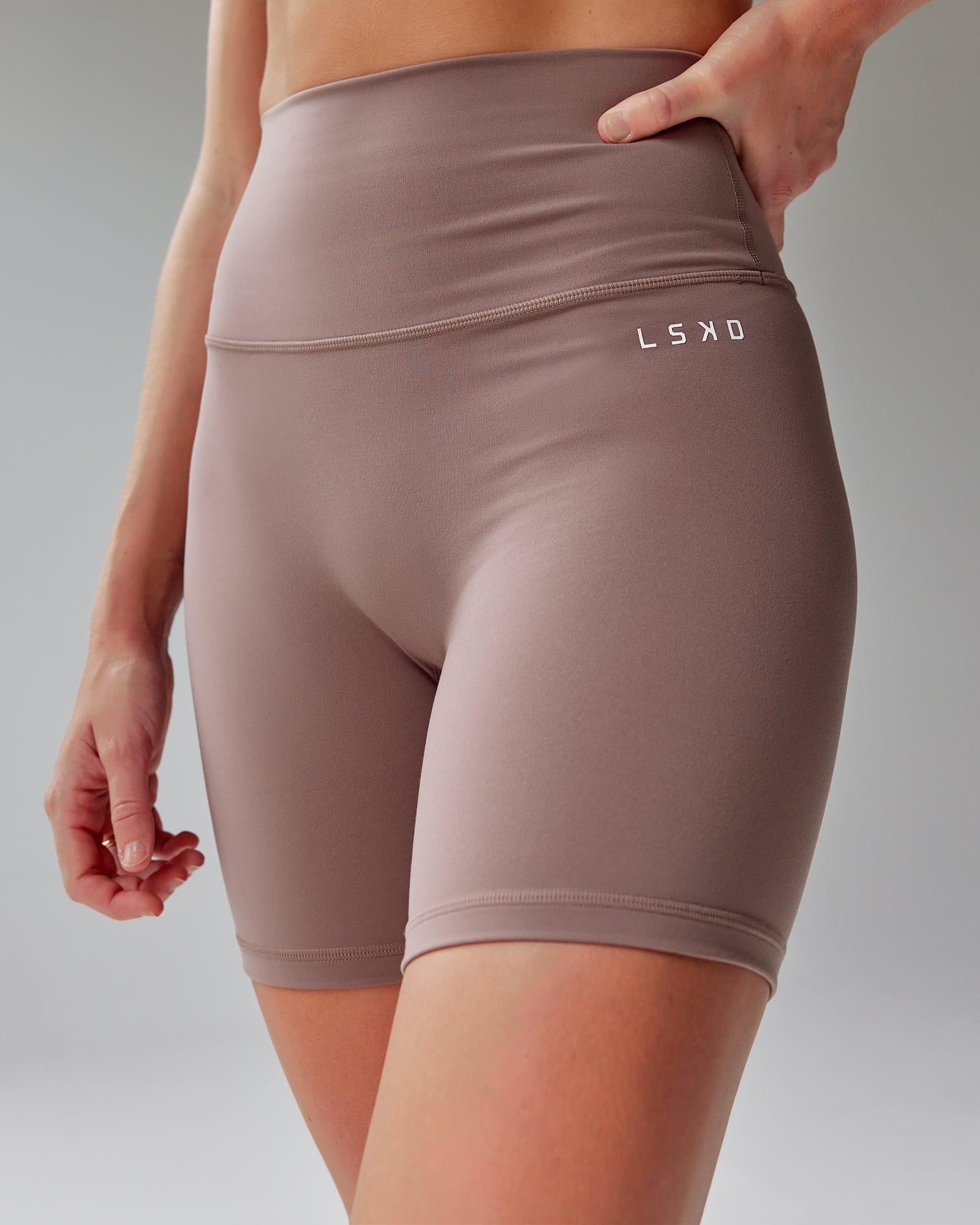 Model wearing Base 2.0 Mid Short Tight - Deep Taupe