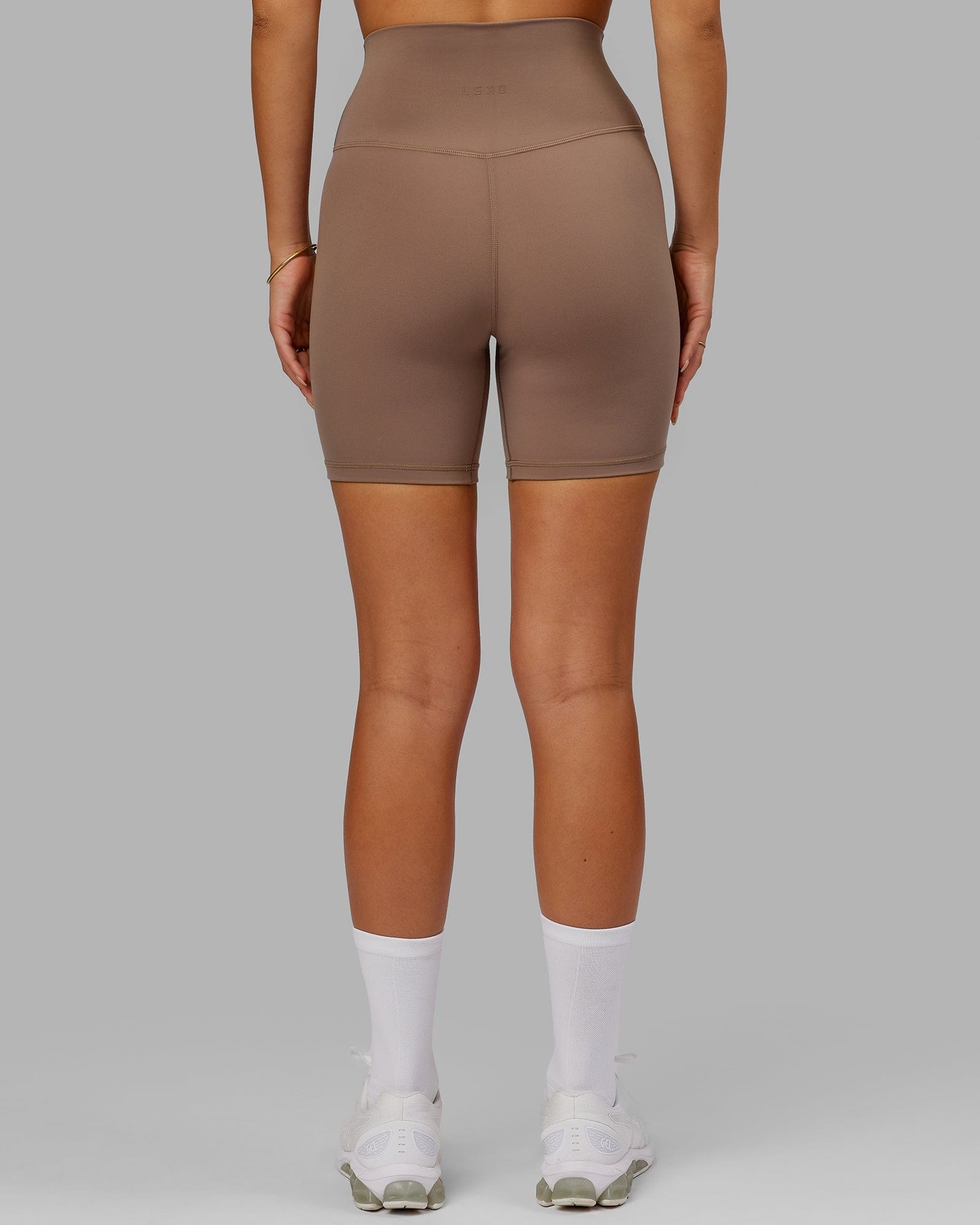 Model wearing Base 2.0 Mid Short Tight - Deep Taupe