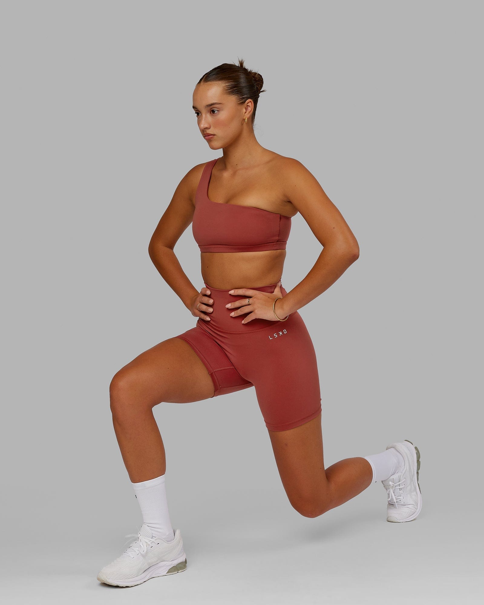 Model wearing Base 2.0 Mid Short Tight - Paprika