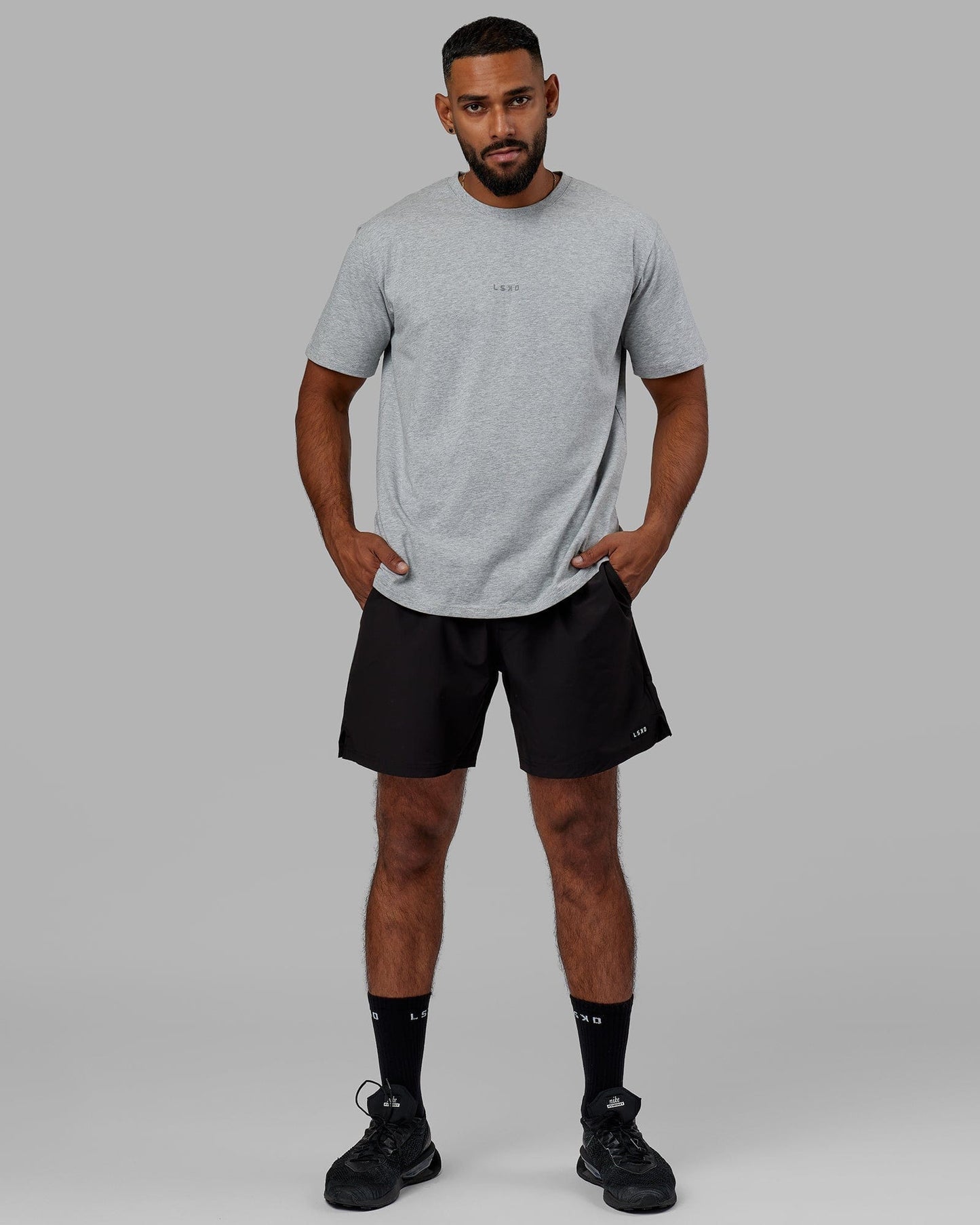 Model wearing Base FLXCotton Tee - Lt Grey Marl