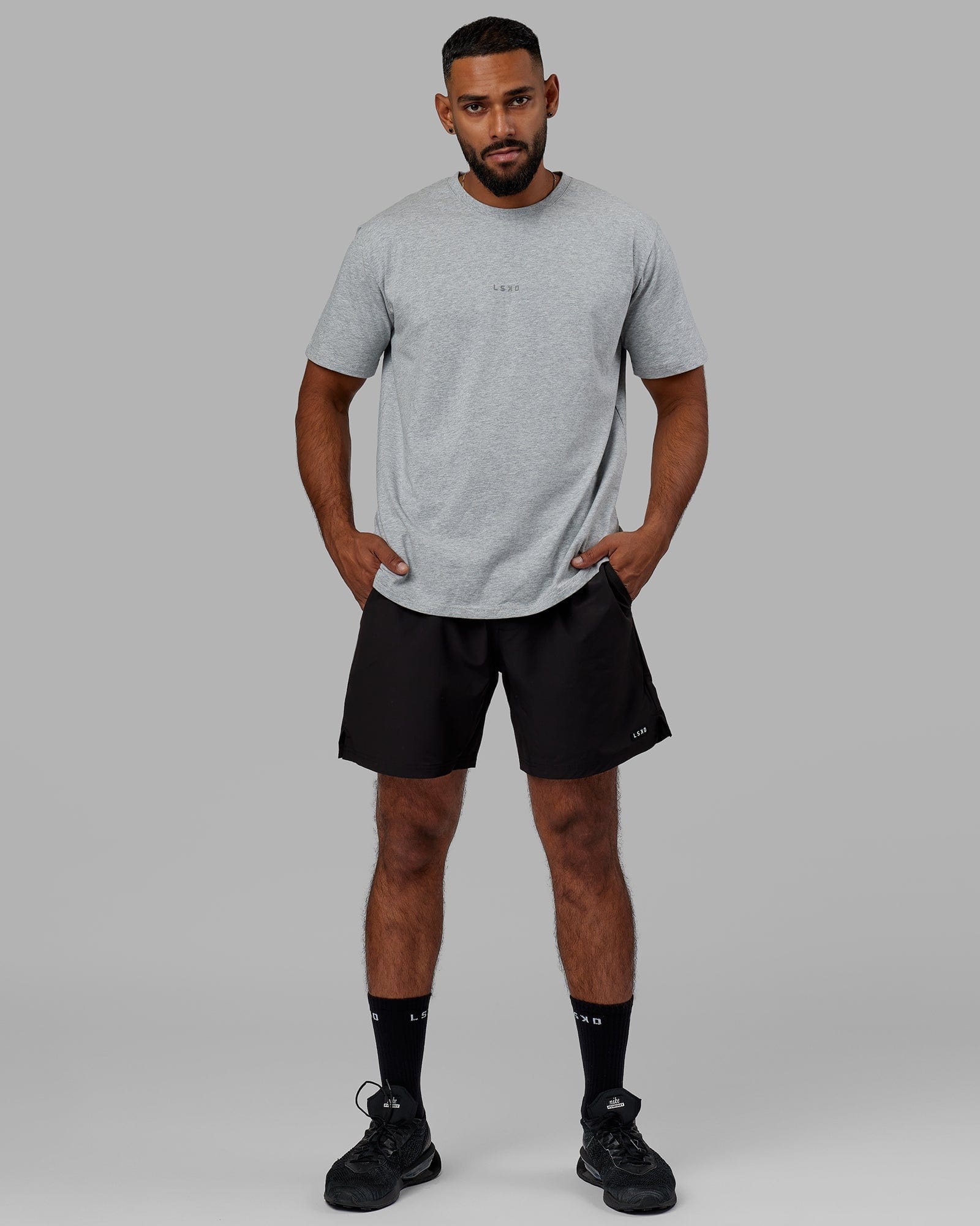 Model wearing Base FLXCotton Tee - Lt Grey Marl