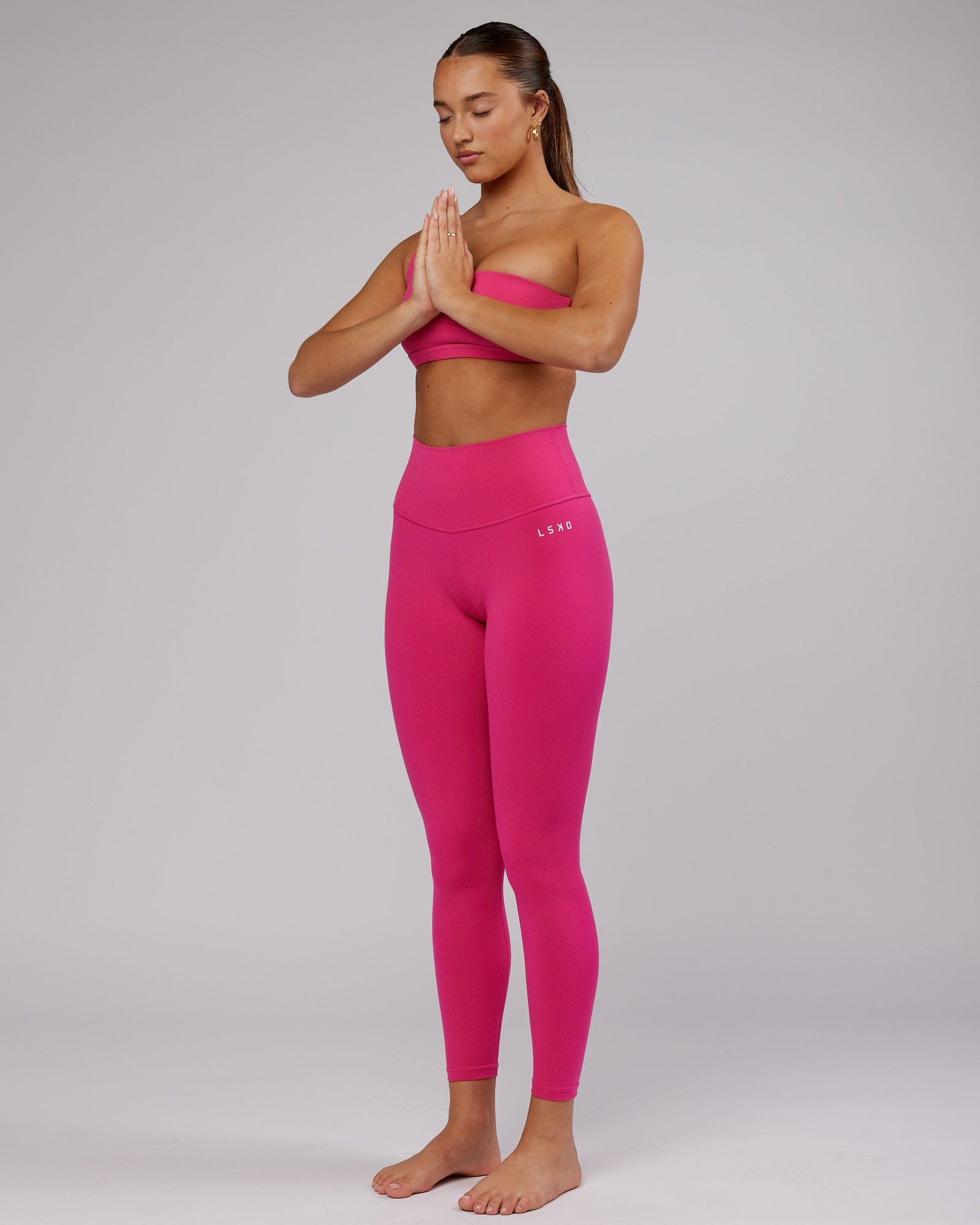 Model wearing Base Full Length Tight - Magenta