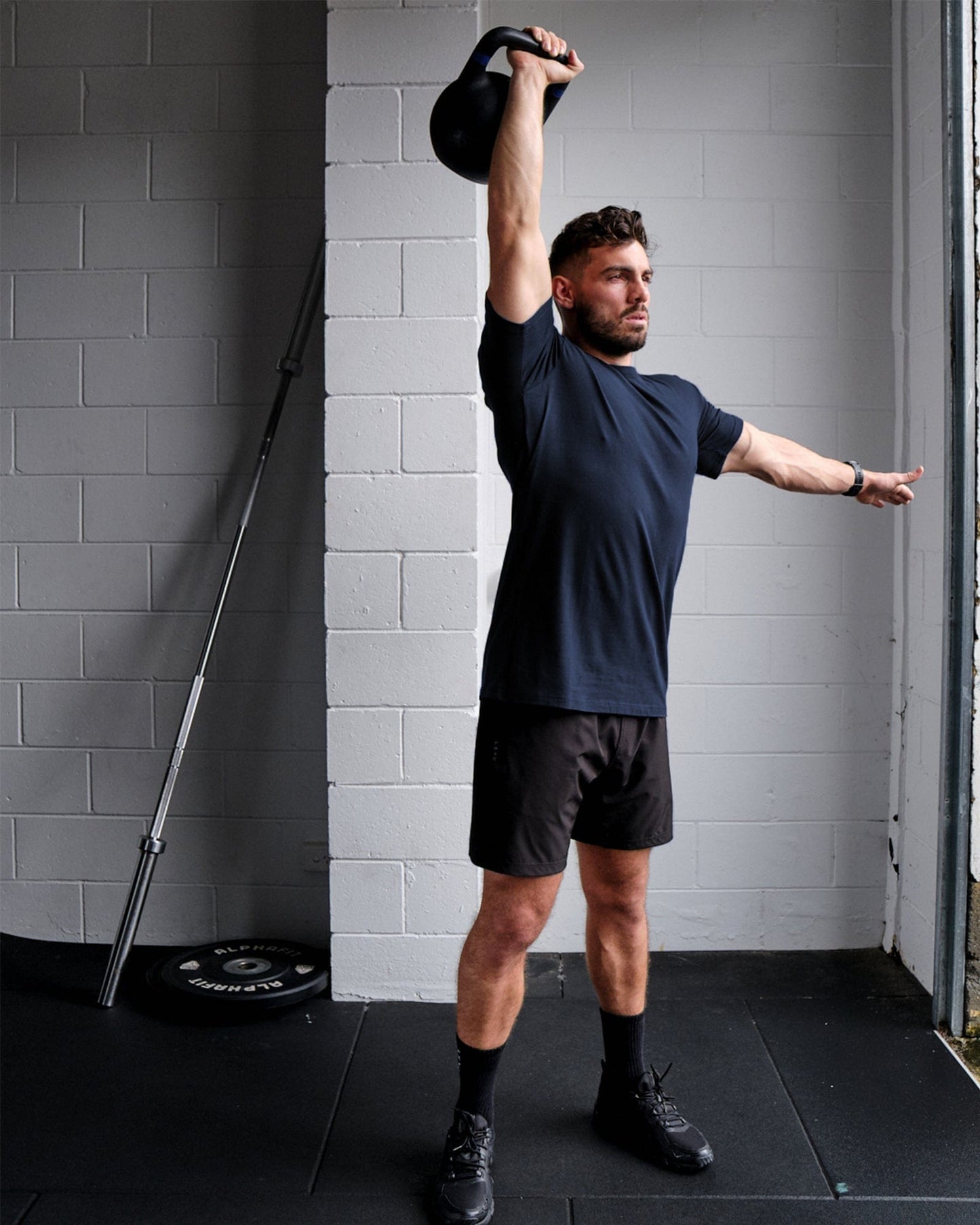 Model wearing Rival FLXCotton Training Fit Tee - Carbon