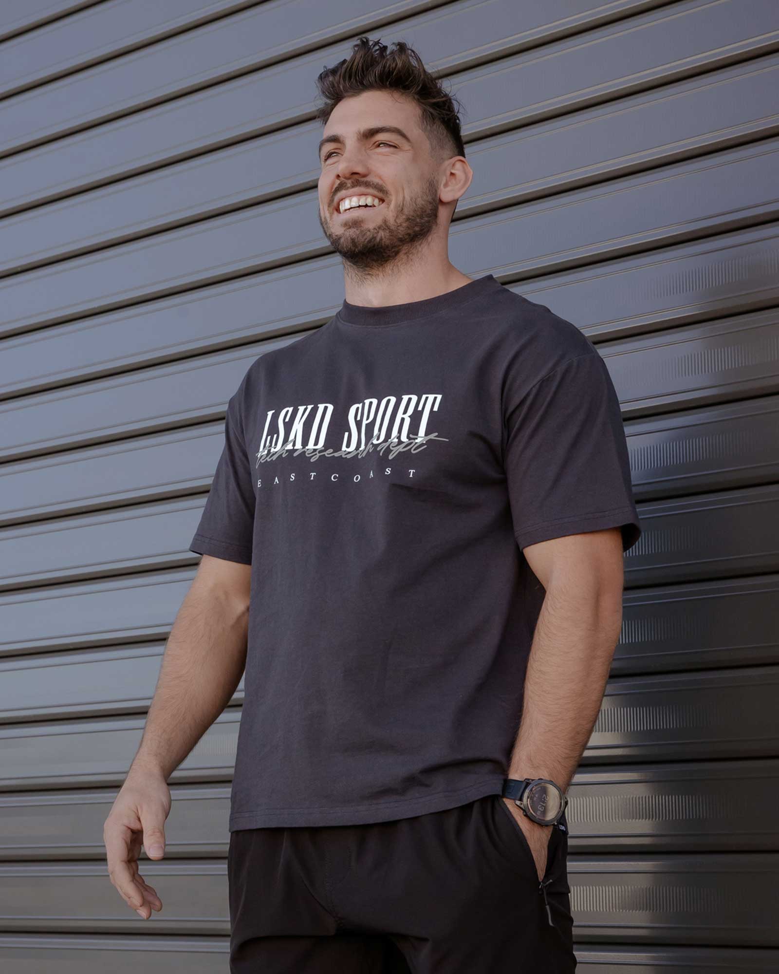 Model wearing Faculty Tee Vintage Fit - Phantom