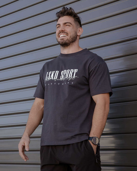 Model wearing Faculty Tee Vintage Fit - Phantom