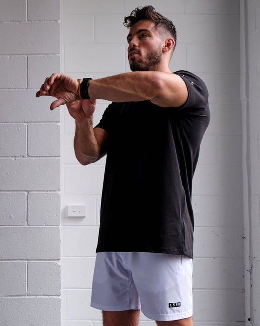 Model wearing Rival FLXCotton Training Fit Tee - Black