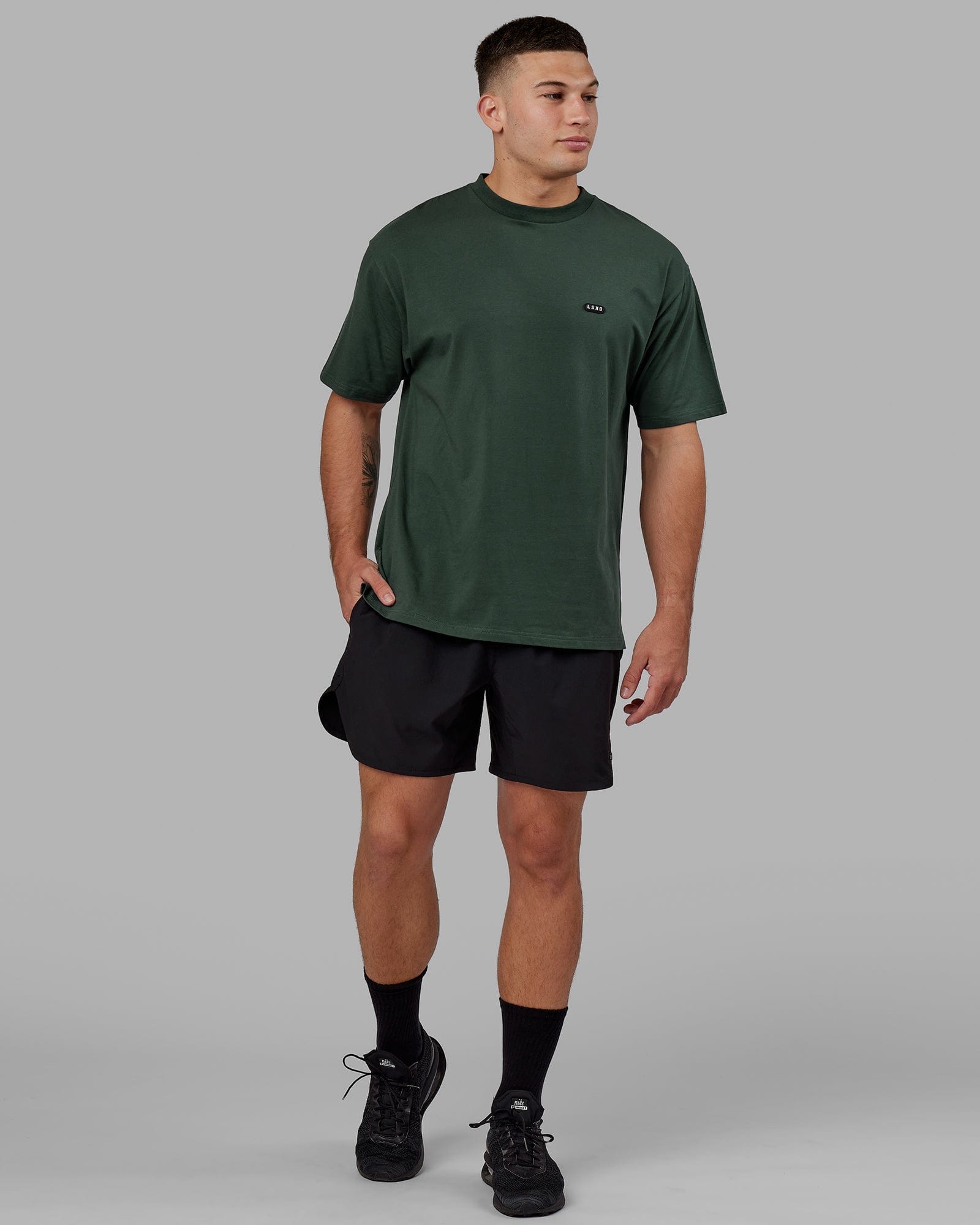 Model wearing Capsule FLXCotton Tee Oversize - Vital Green