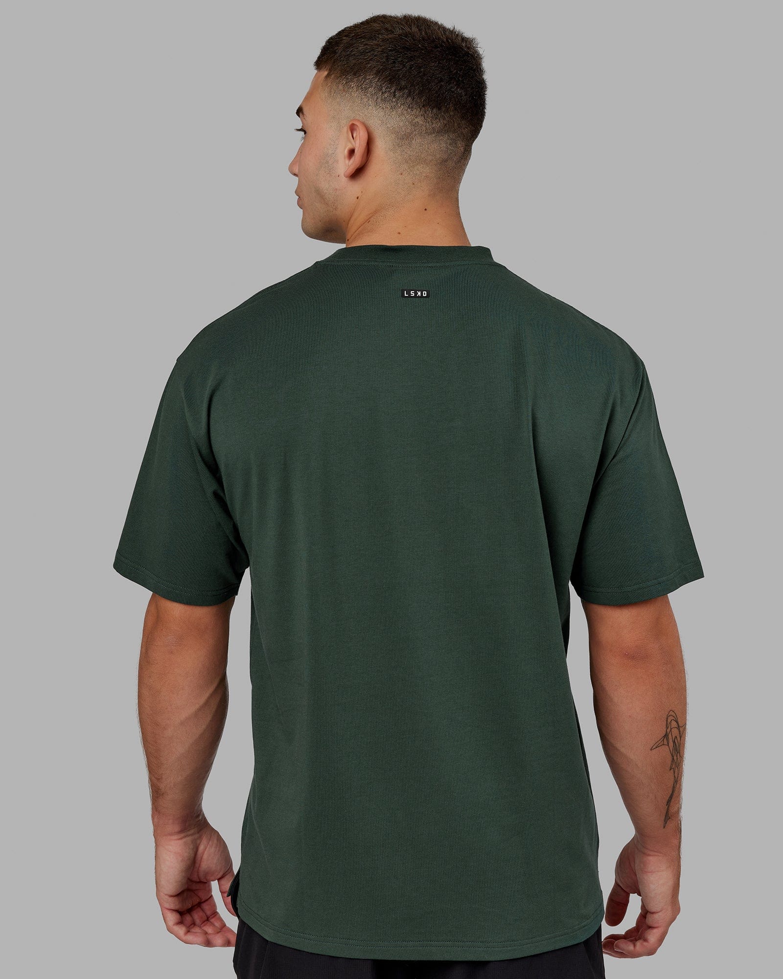 Model wearing Capsule FLXCotton Tee Oversize - Vital Green