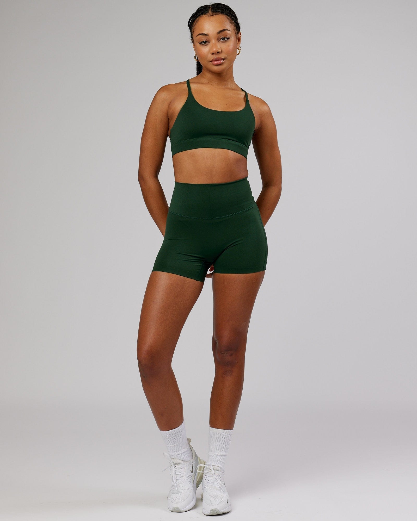 Model wearing Elixir Sports Bra - Ivy Green