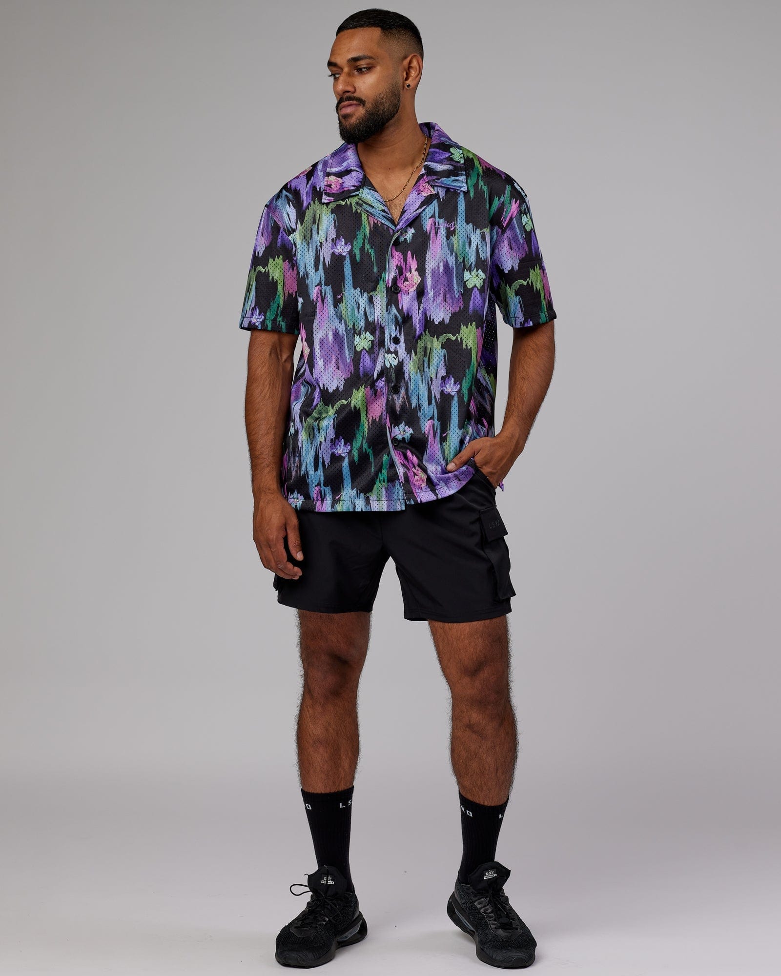 Model wearing Expression Short Sleeve Mesh Shirt - Hyper Floral Black