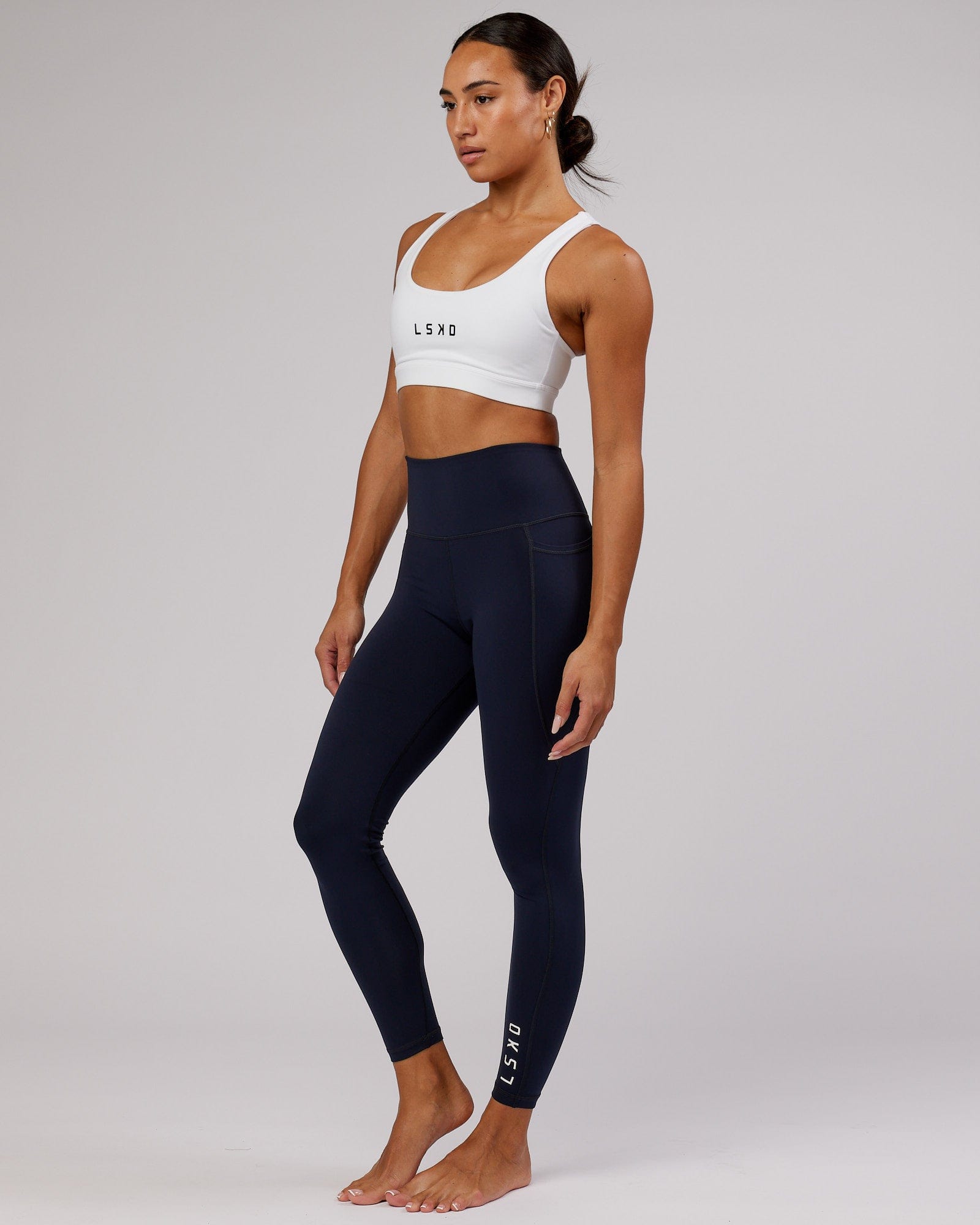 Model wearing Flux Full Length Tight - Navy