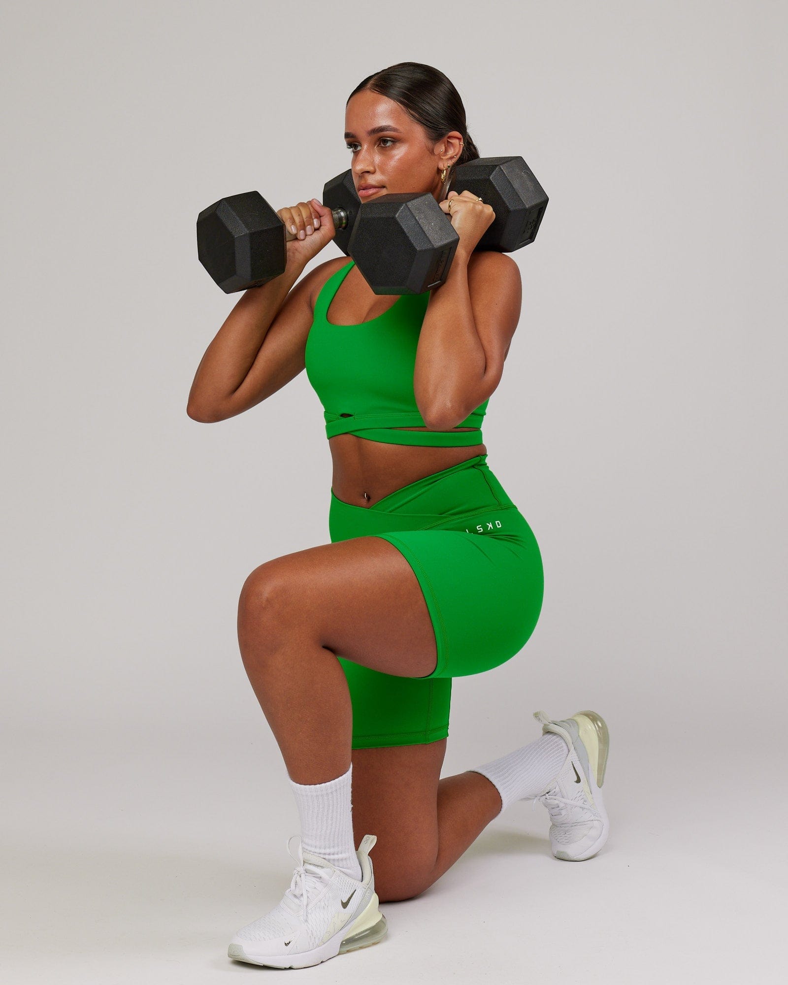 Model wearing Force Sports Bra - Vivid Green