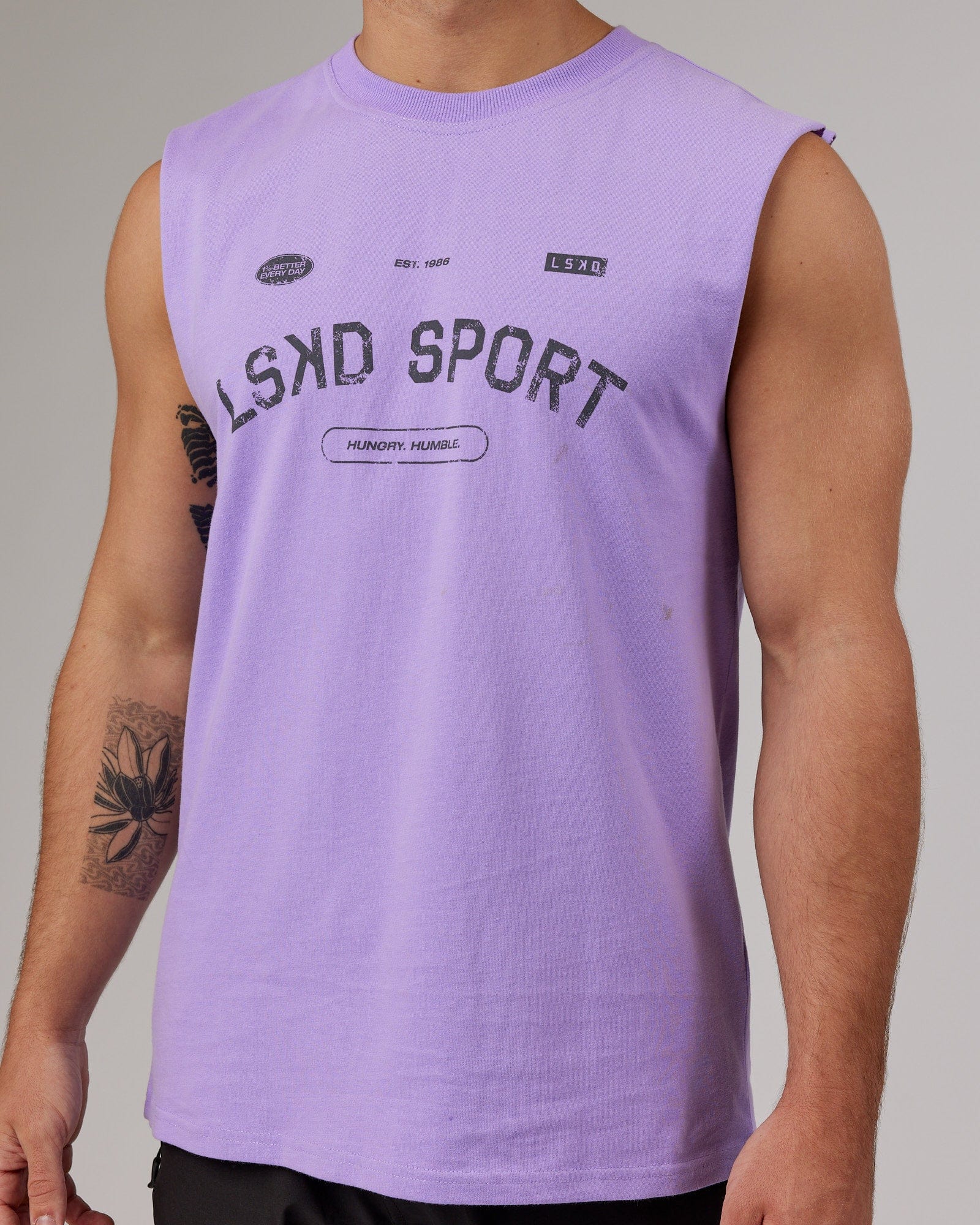 Model wearing Free Throw Heavyweight Tank Oversize - Peak Purple